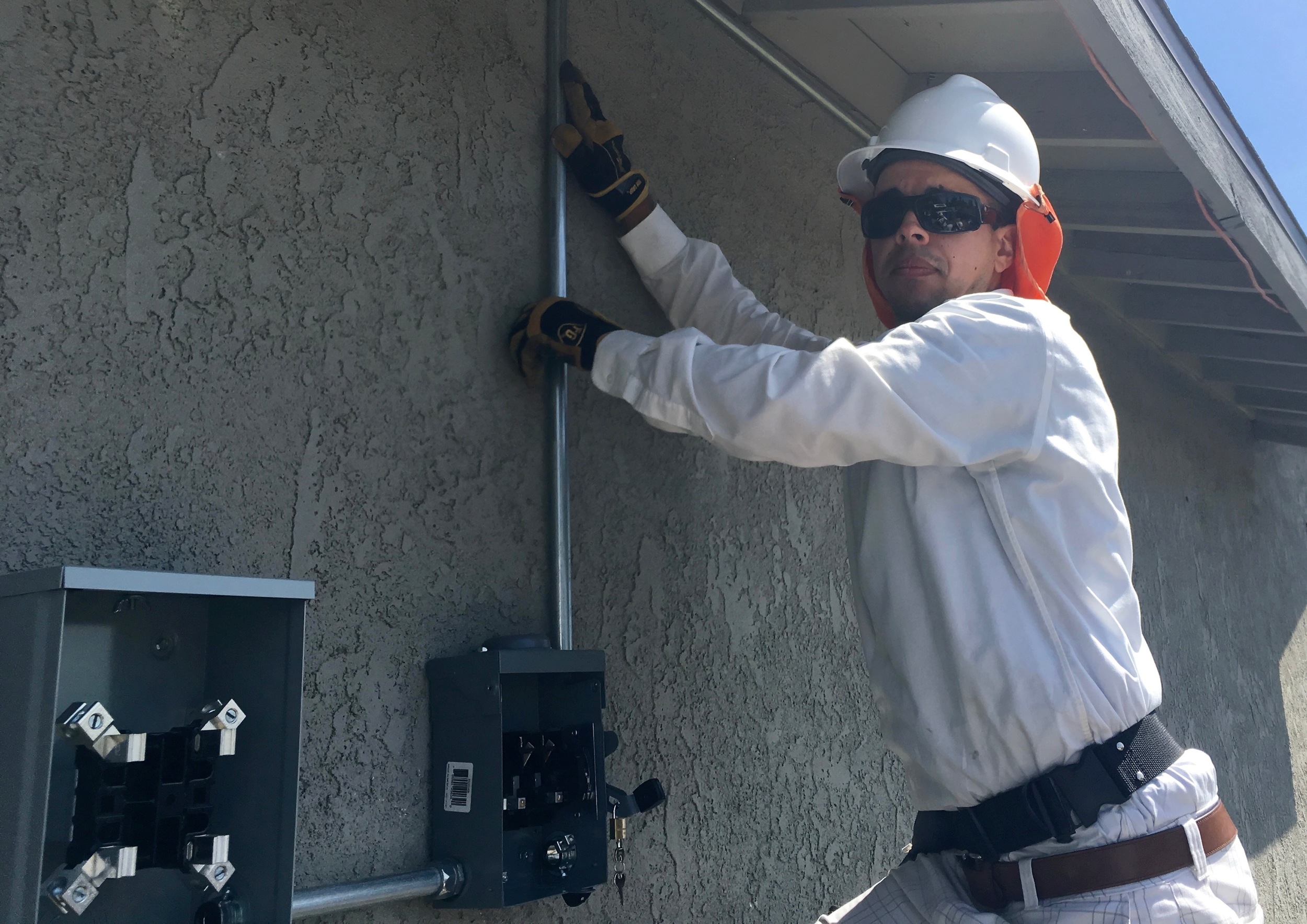 The amazing Keaton McGuire, GRID Solar Installation Supervisor (SIS) running an install in San Bernardino. 