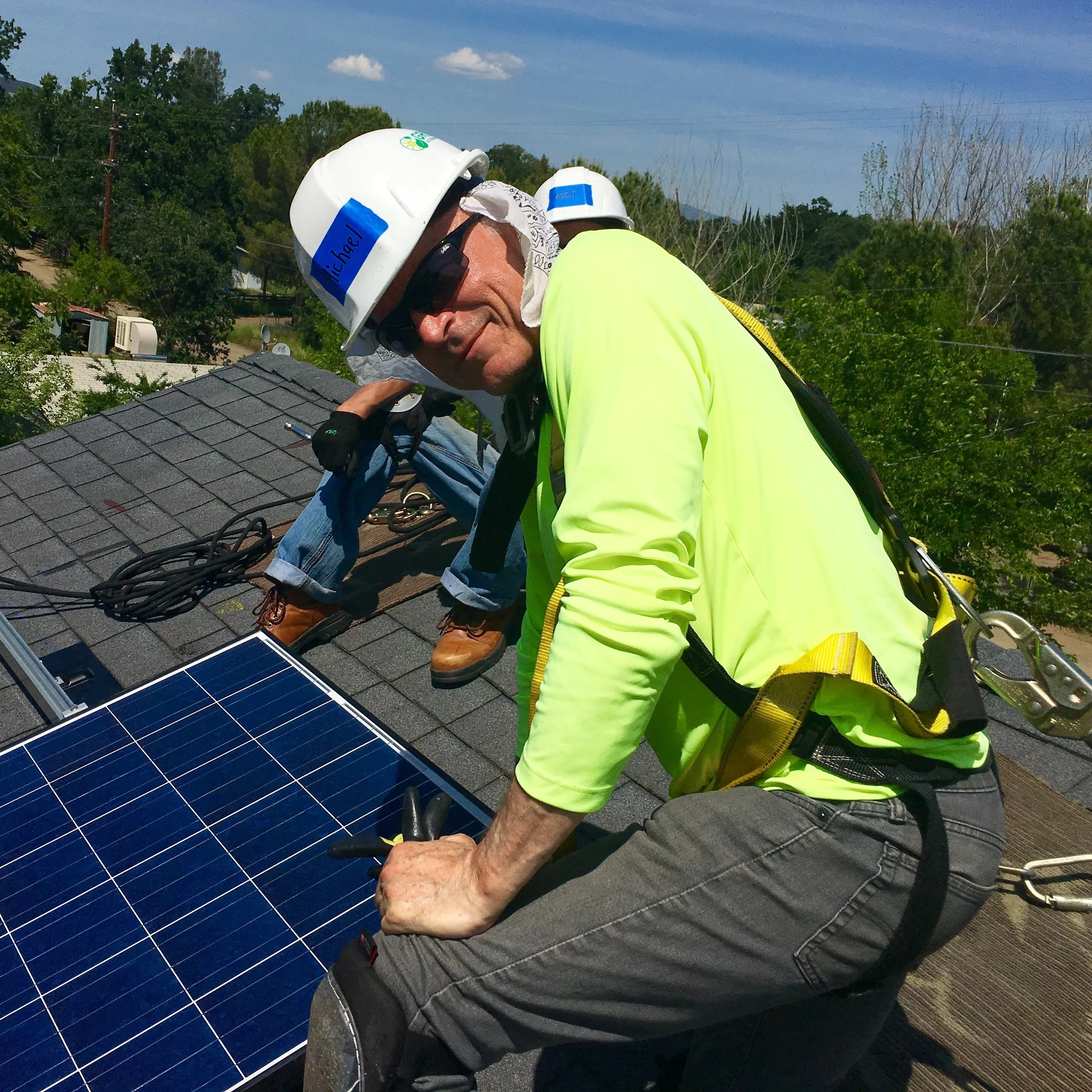 Me on a roof on the Clear Lake installation. It was hot!&nbsp;