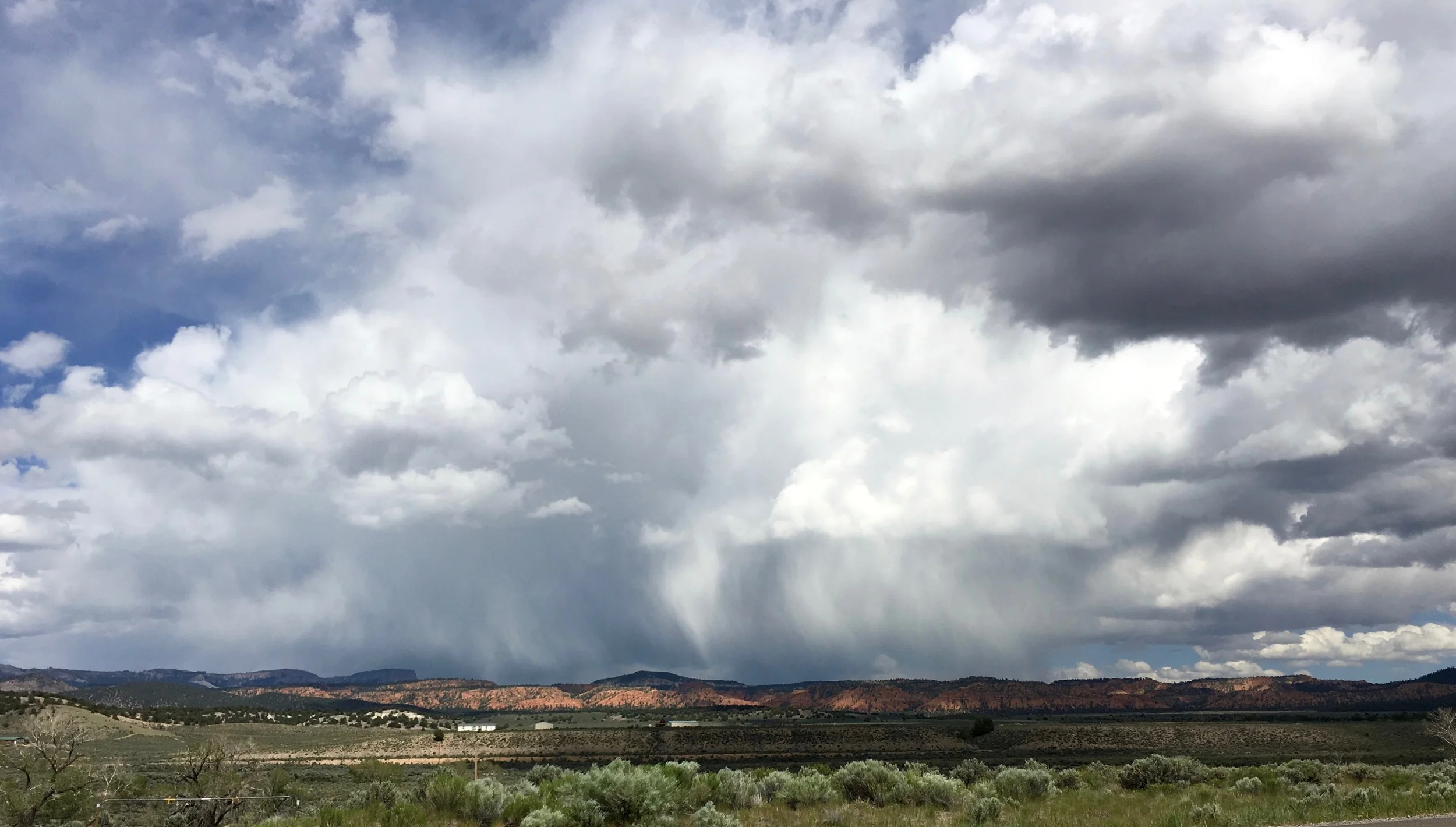 Rain clouds near Panguitch, Utah, as I biked toward Red Canyon State Park. 
