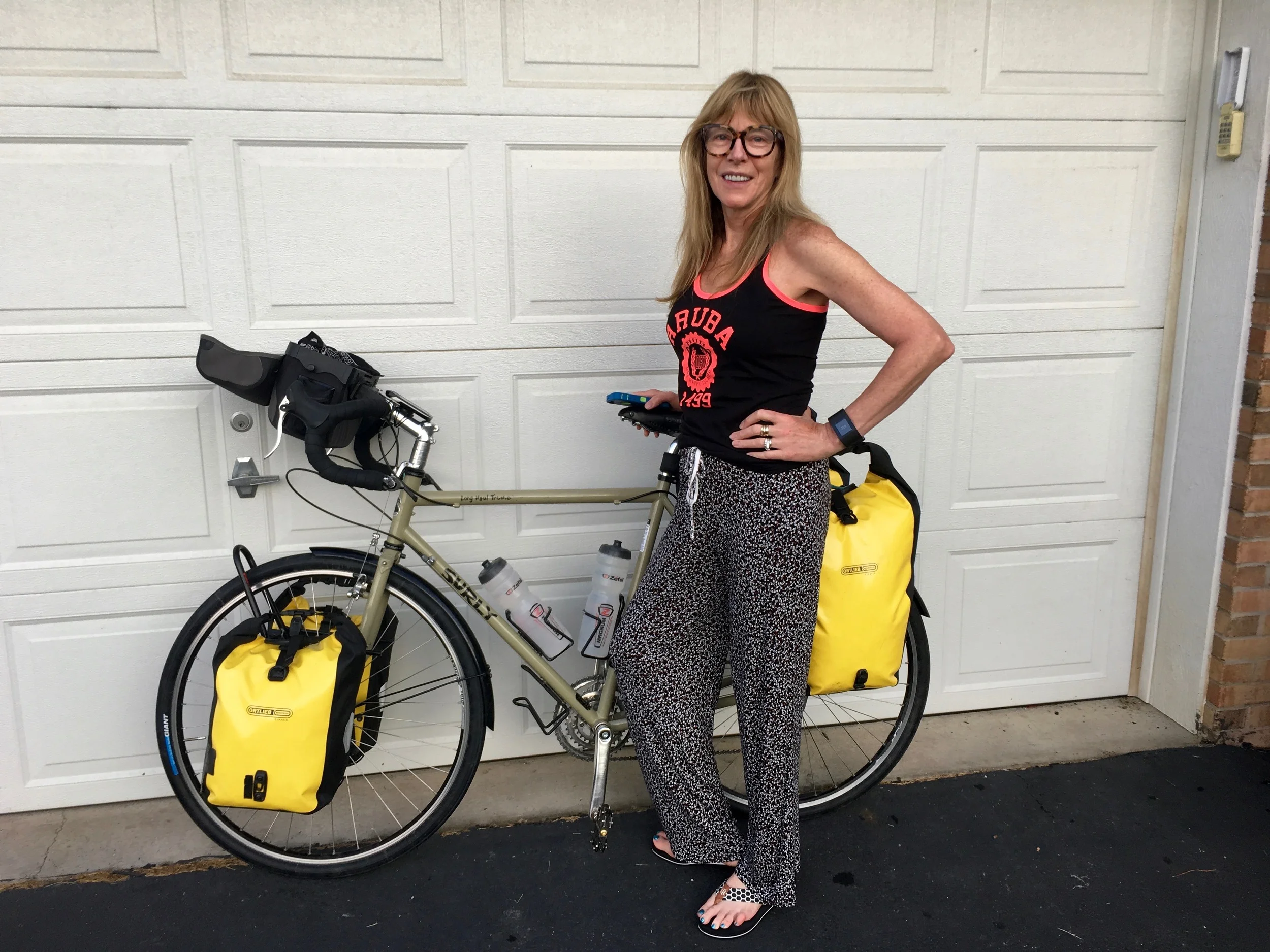 My host Kitty posing with my bike before I left the Pittsburgh area on August 1.&nbsp;