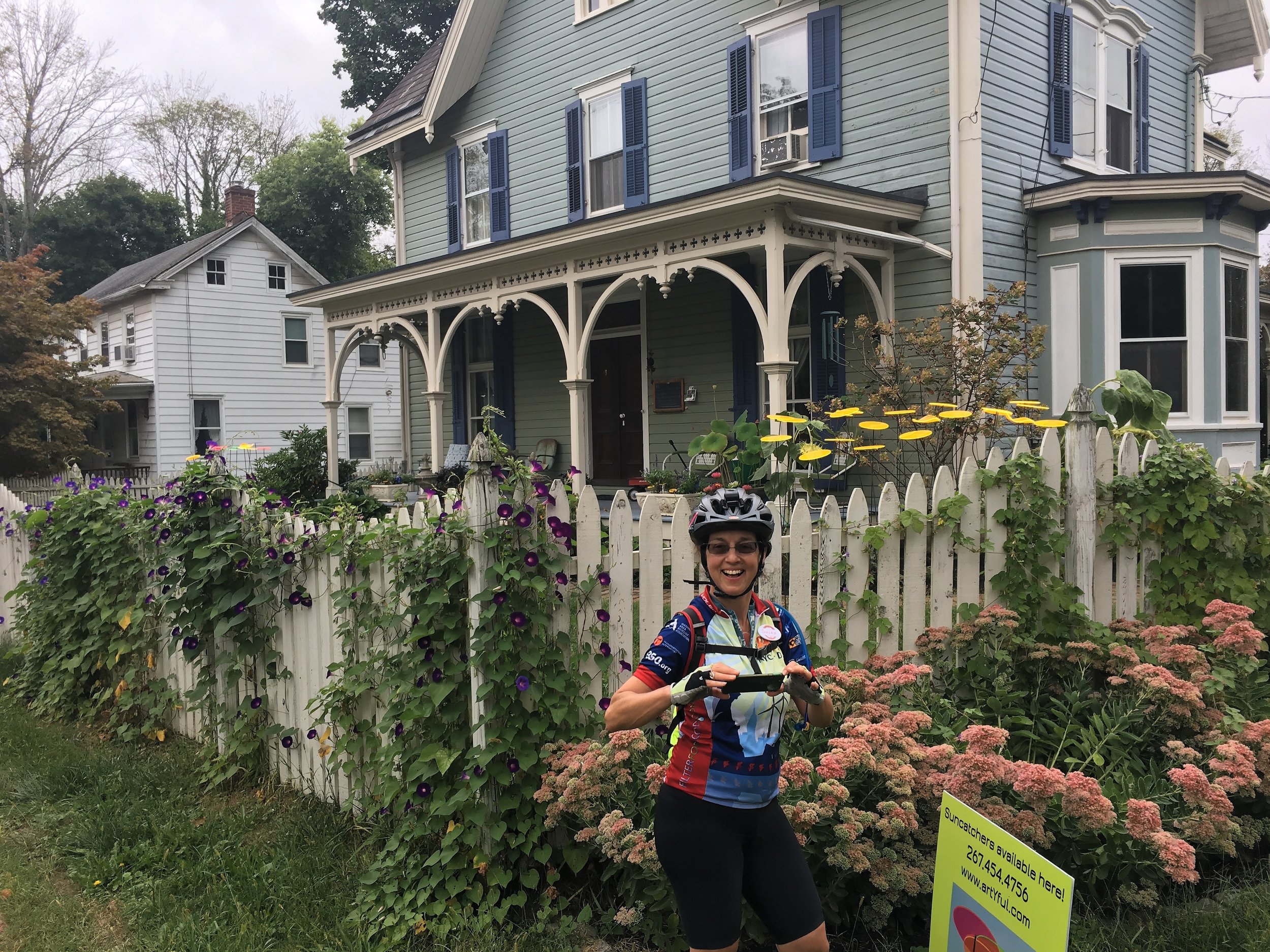 Susan Benesch in front of a classic PA home