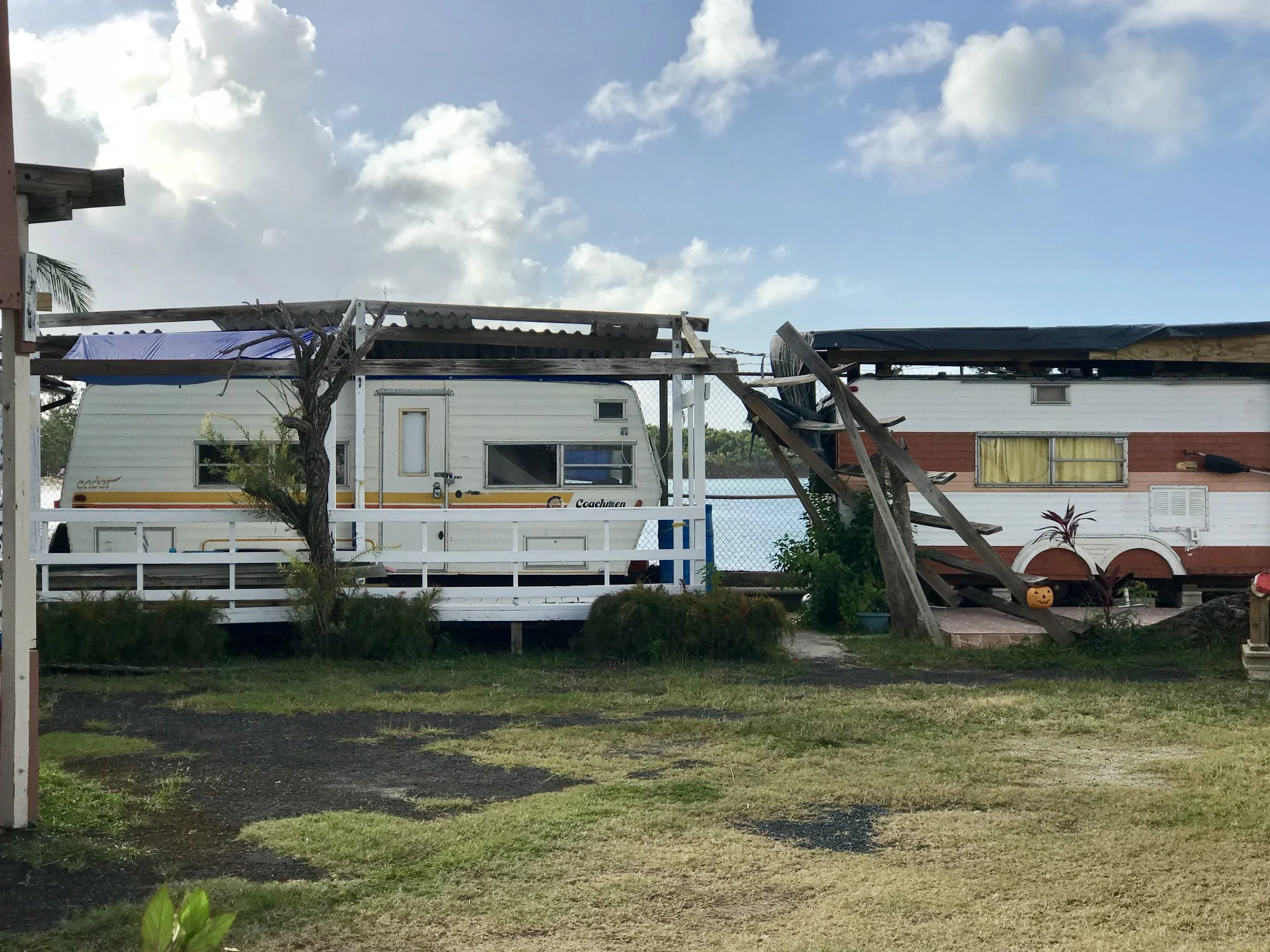 These homes are right on the beach and are currently occupied.
