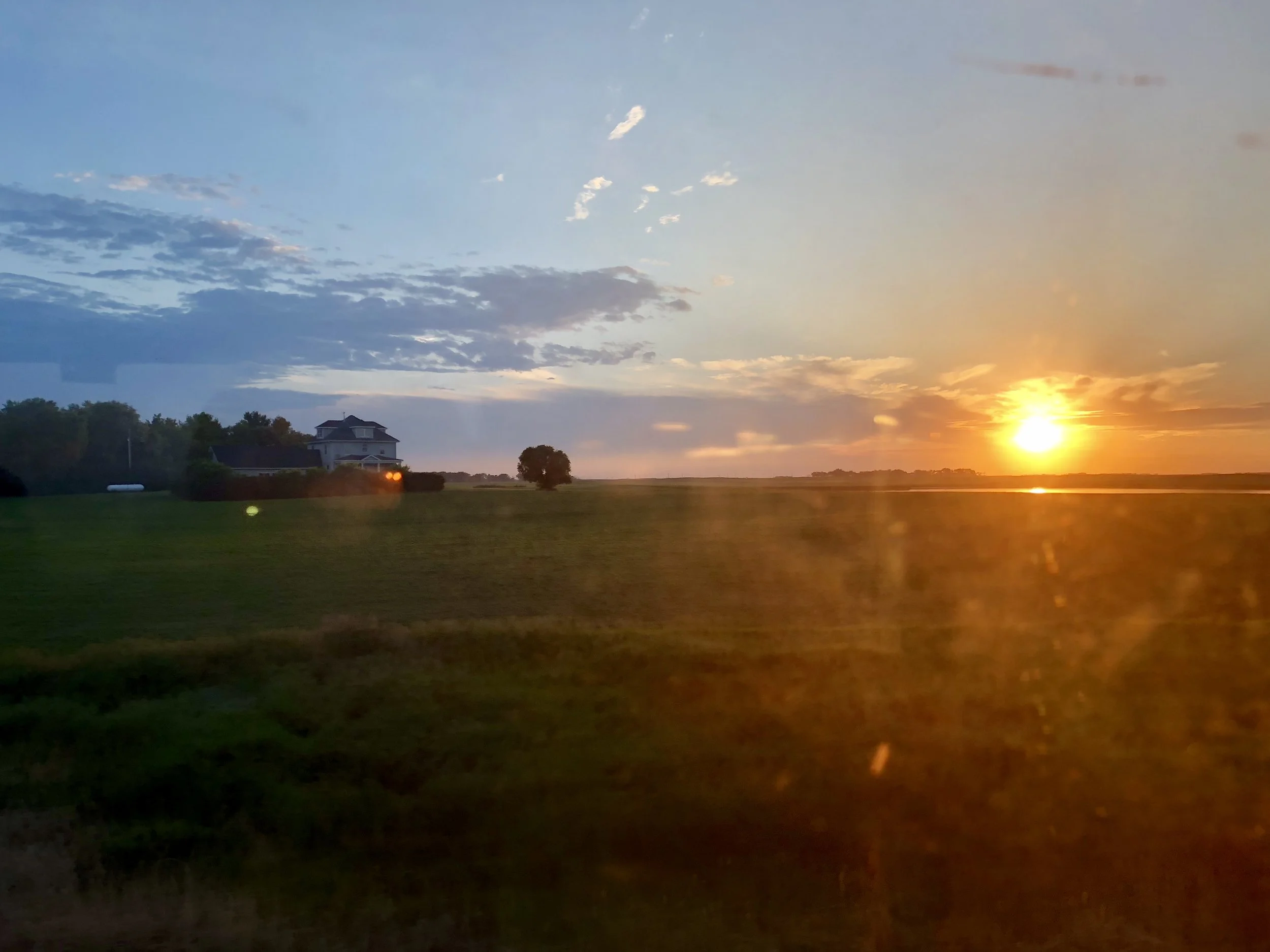 Minnesota sunset from the window of the train.  