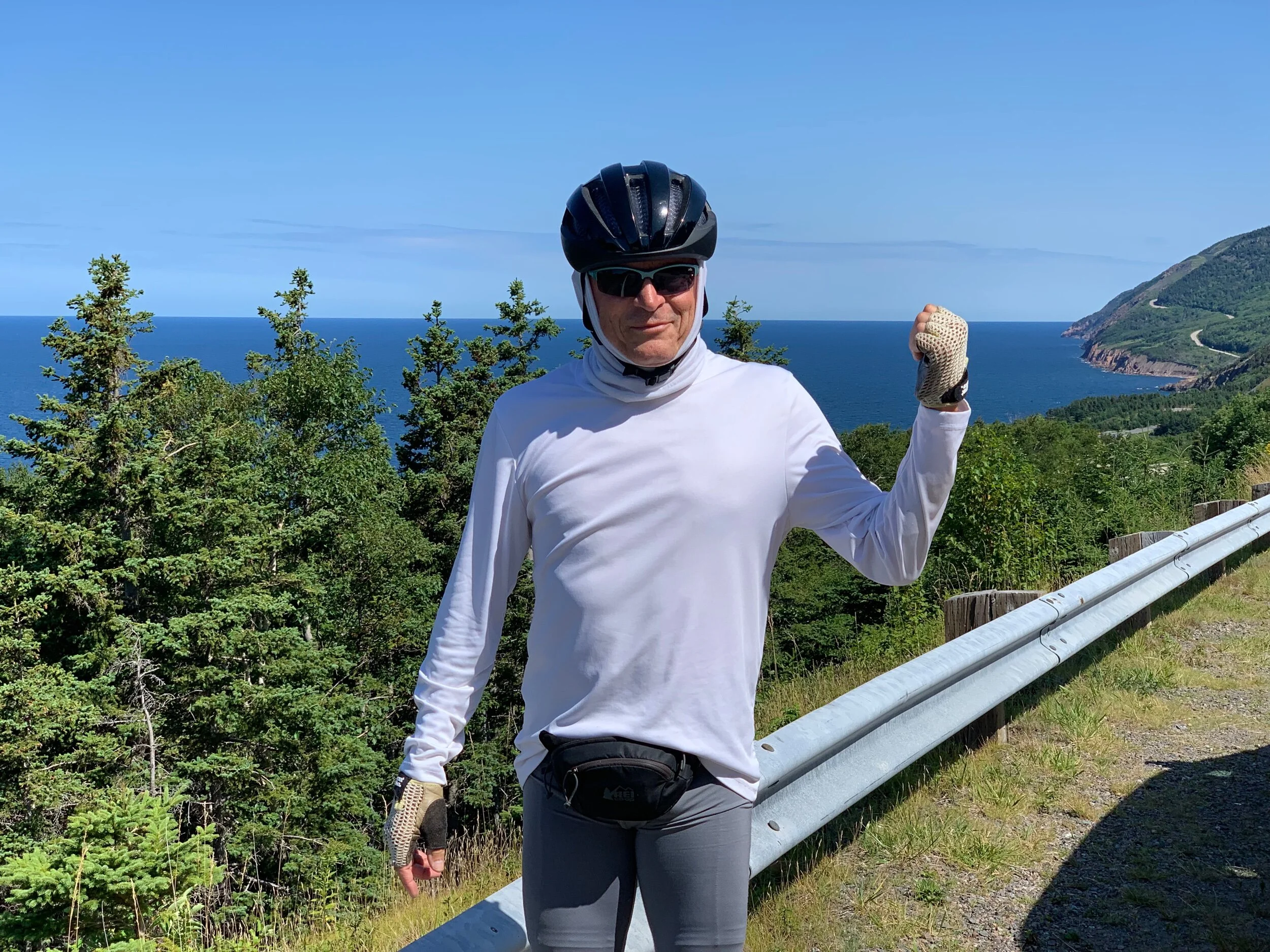 Michael gesturing toward the Northumberland Straight in Cape Breton.