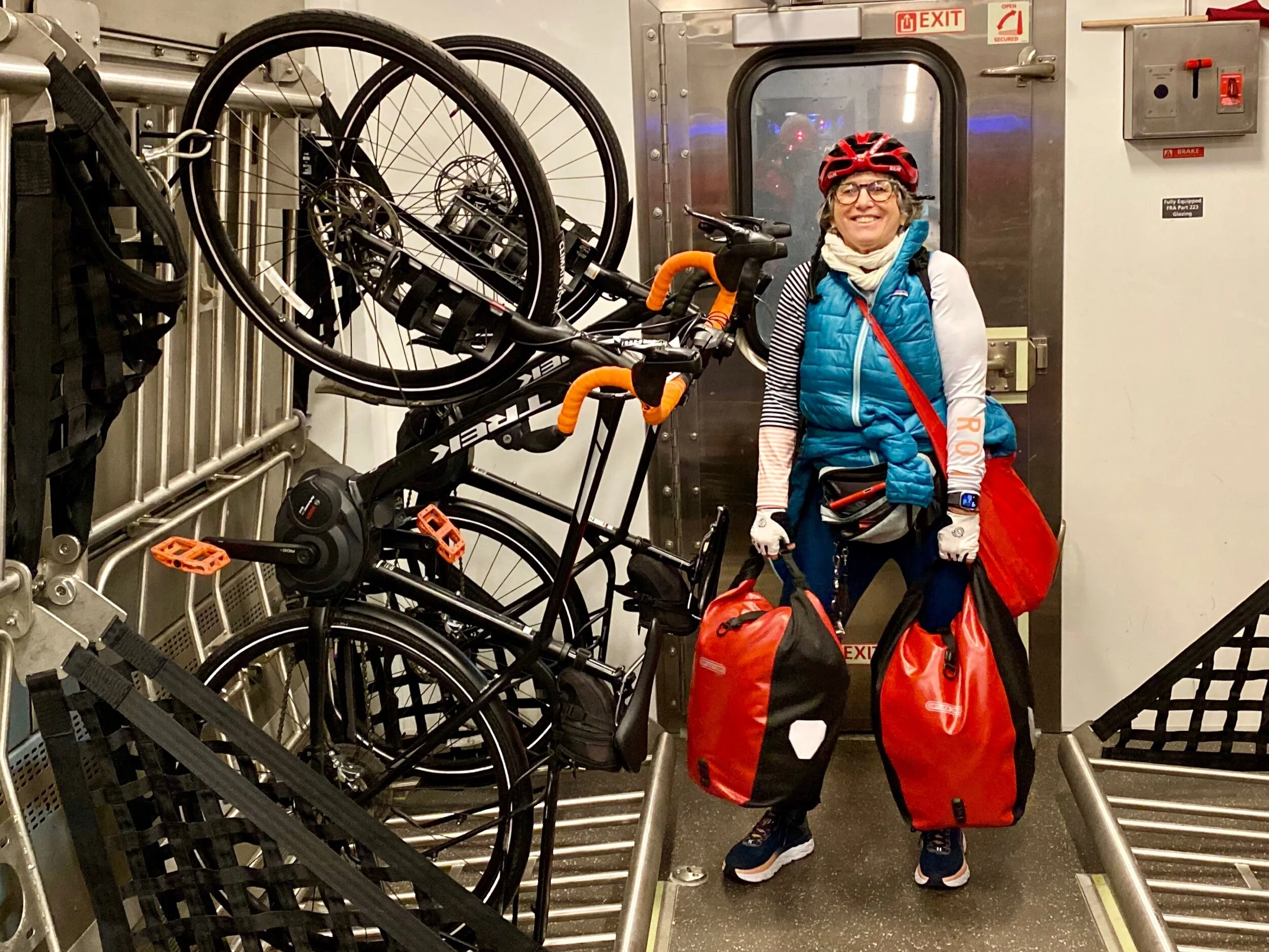 Jenny Hershey with her gear standing beside our bikes as we board in NYC.