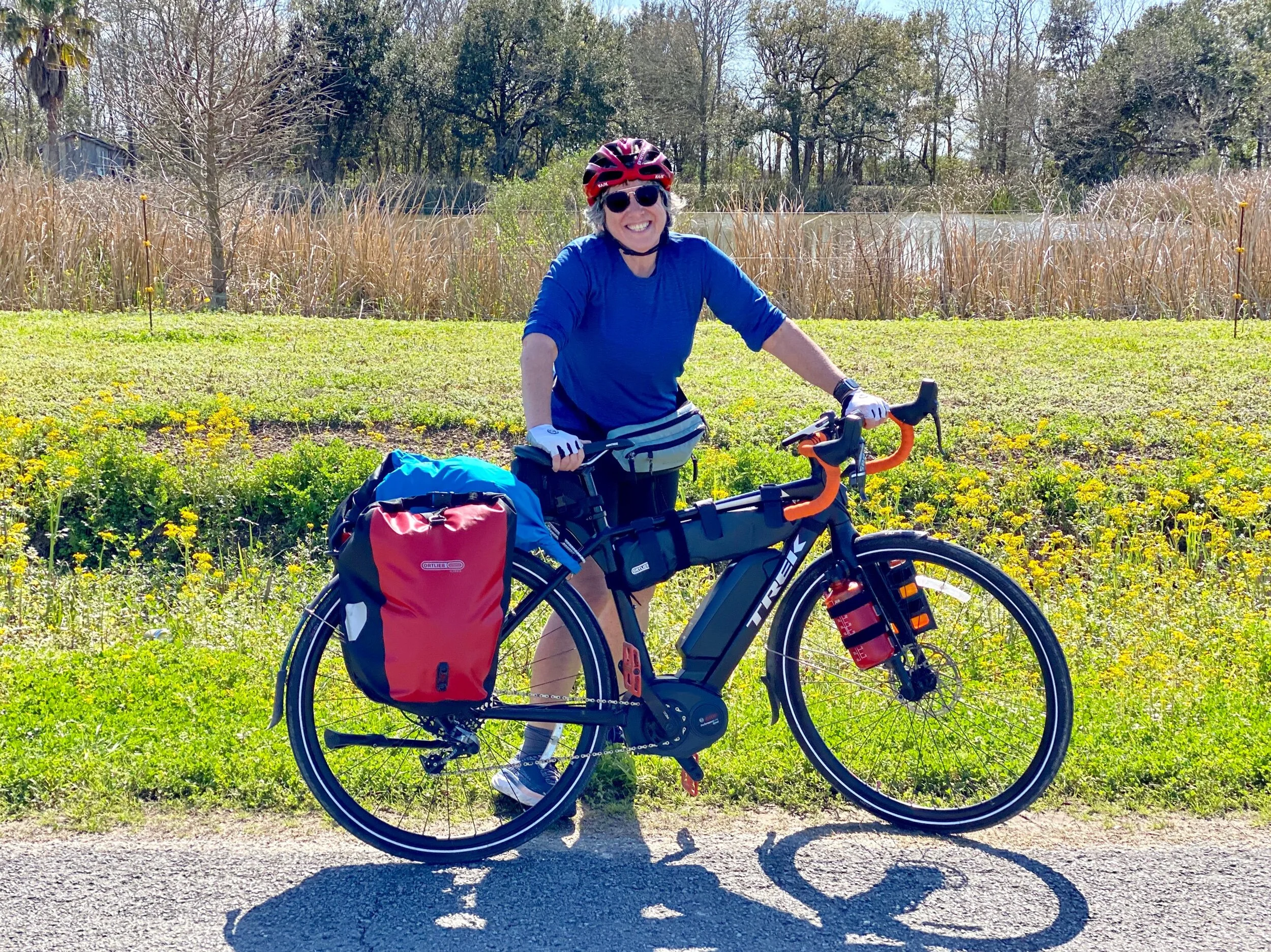 Jenny with her bike on the way to Lake Arthur, LA.
