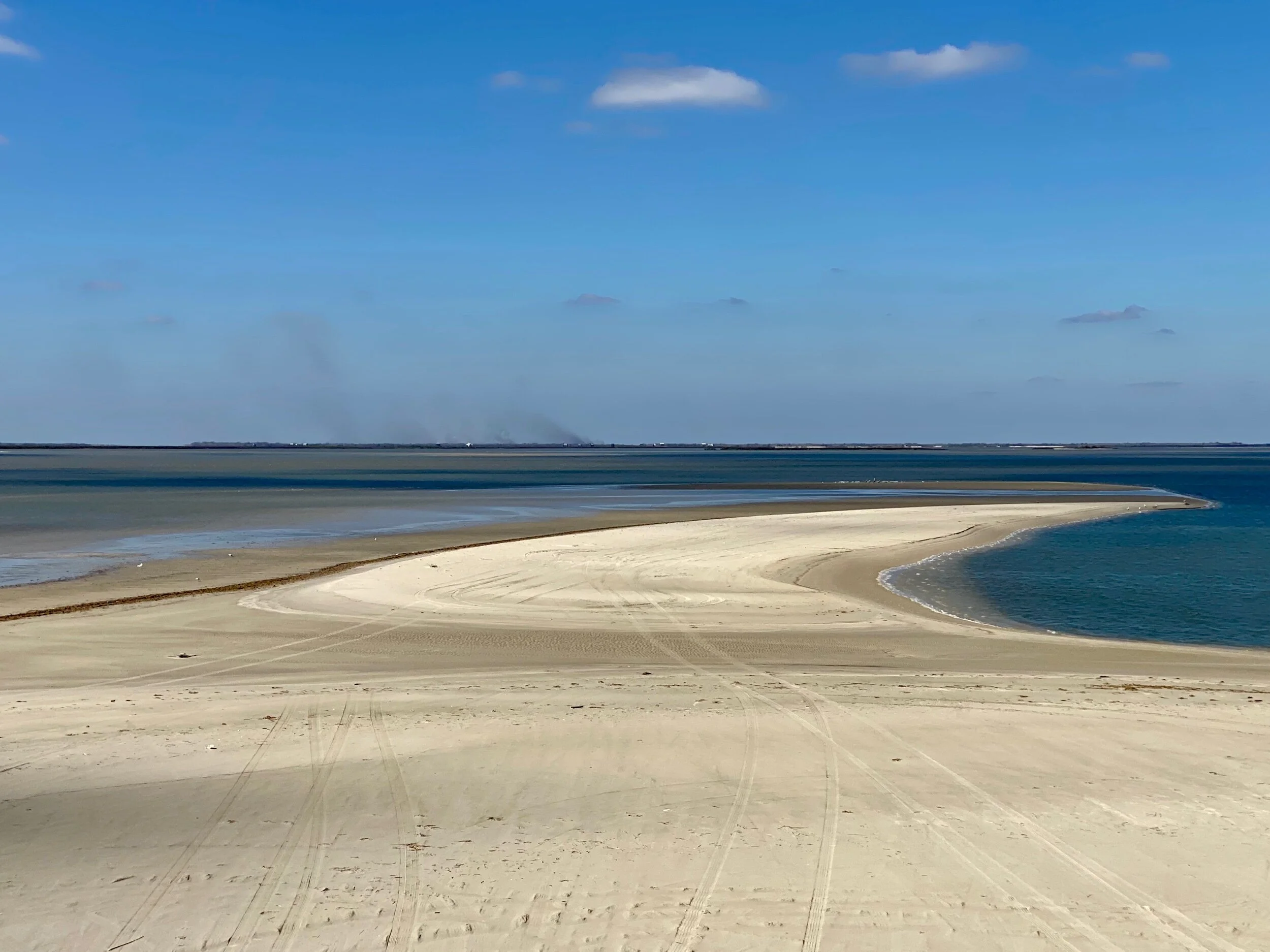 On the way to Freeport, Texas. We learned later the smoke in the background is from a Dow Chemical plant that removes magnesium from sea water.