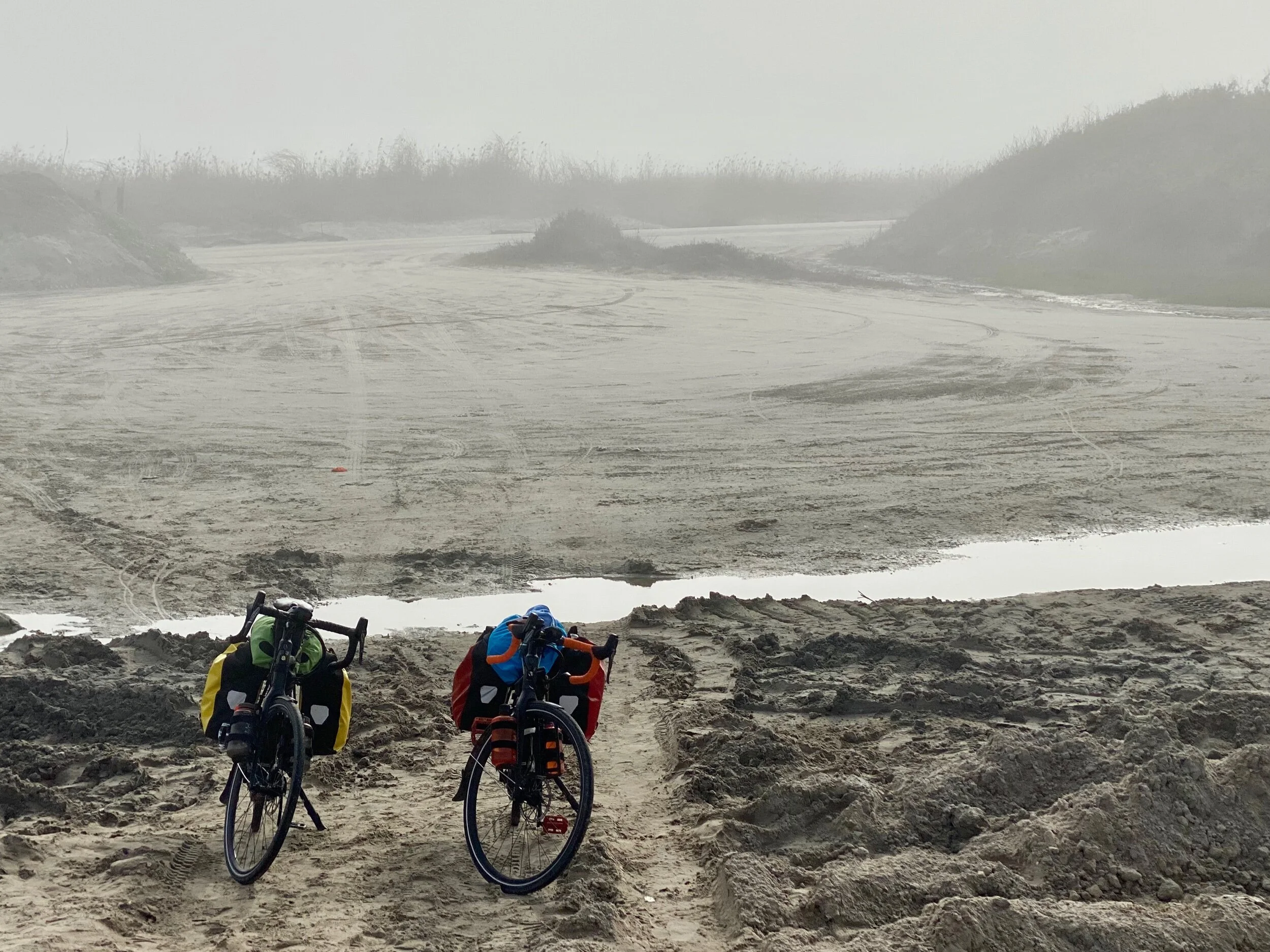 Our bikes in fog at the beach on Port Aransas Beach, Texas.