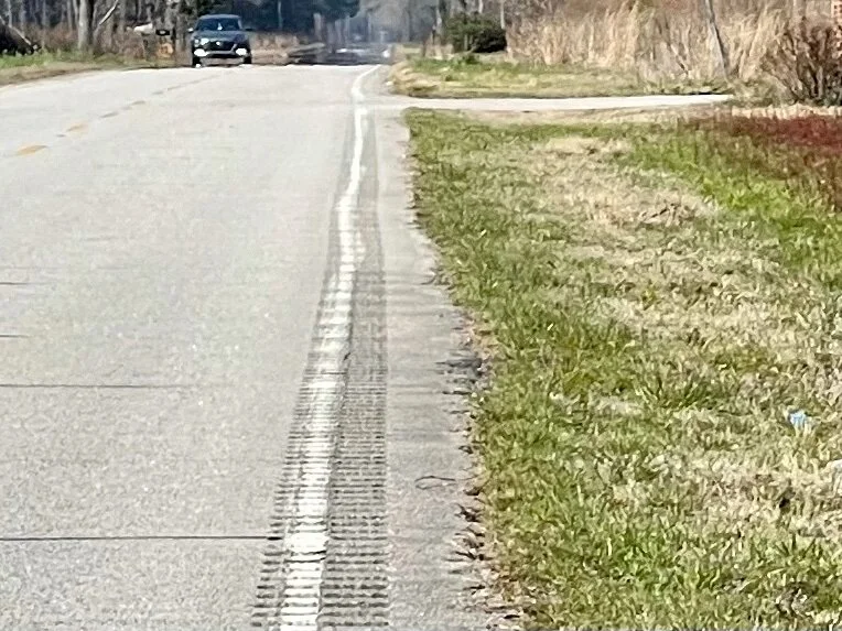 A typical road in South Carolina. While North Carolina has skinny or nonexistent shoulders, South Carolina has a terrible practice of adding rumble strips to their very narrow or nonexistent shoulders (at extra cost to taxpayers)! This might be help…
