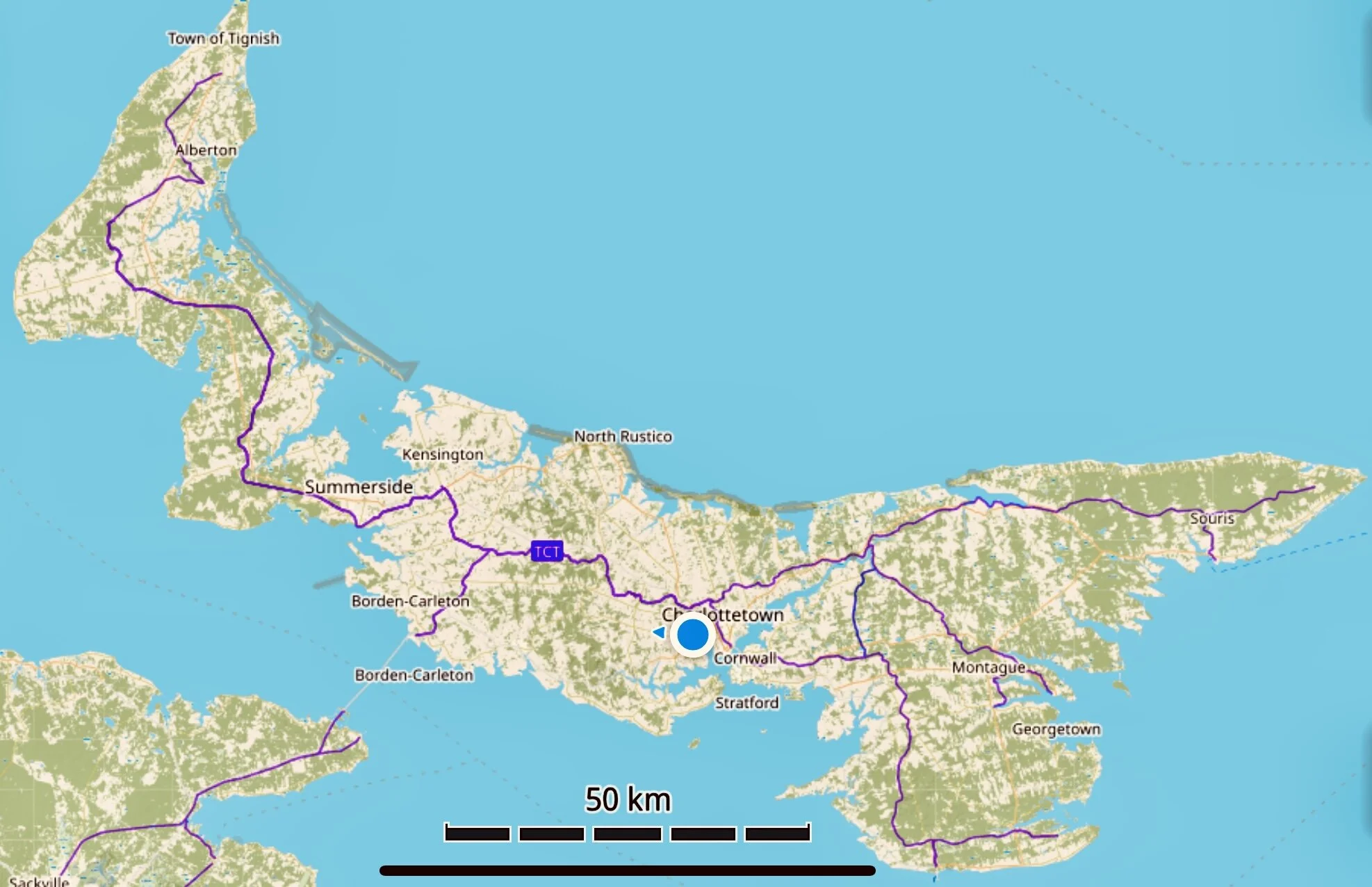 Charlottetown is near the blue dot. This is PEI’s largest city, with a metropolitan population of about 80,000 of the island’s 160,000 people. The purple lines on this map form the spine and the spurs of the Confederation Trail. The points at the ends of the wings are North Point in the northwest and East Point in the east. There are wind farms near both points, the largest in North Point. Currently, renewables supply about 25% of the Province’s power; they will supply 100% by 2040. PEI has no natural gas lines, and most cooking and heating is already electric. Summerside, a town in central PEI of about 15,000, uses wind farms, solar arrays, smart grids, industrial-scale lithium-ion batteries and the highest per capita concentration of&nbsp;electric car&nbsp;chargers in the country, and expects to derive the majority of its electricity from renewable sources by 2022. A fascinating story is how the town is dealing with the problem of intermittency: there are a suite of specialized appliances in homes throughout the city that can store energy as heat rather than electricity. This can be read about in more depth here.  Photo from GuruMaps Pro.