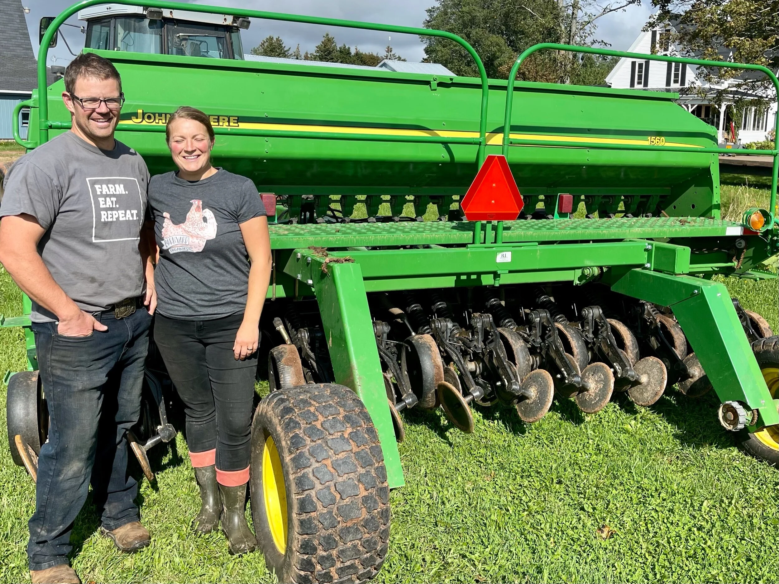 Mark and Sally standing next to their new “no-till” seeder. Photo by Michael Chase. Follow him on Instagram @mjohnsonchase.