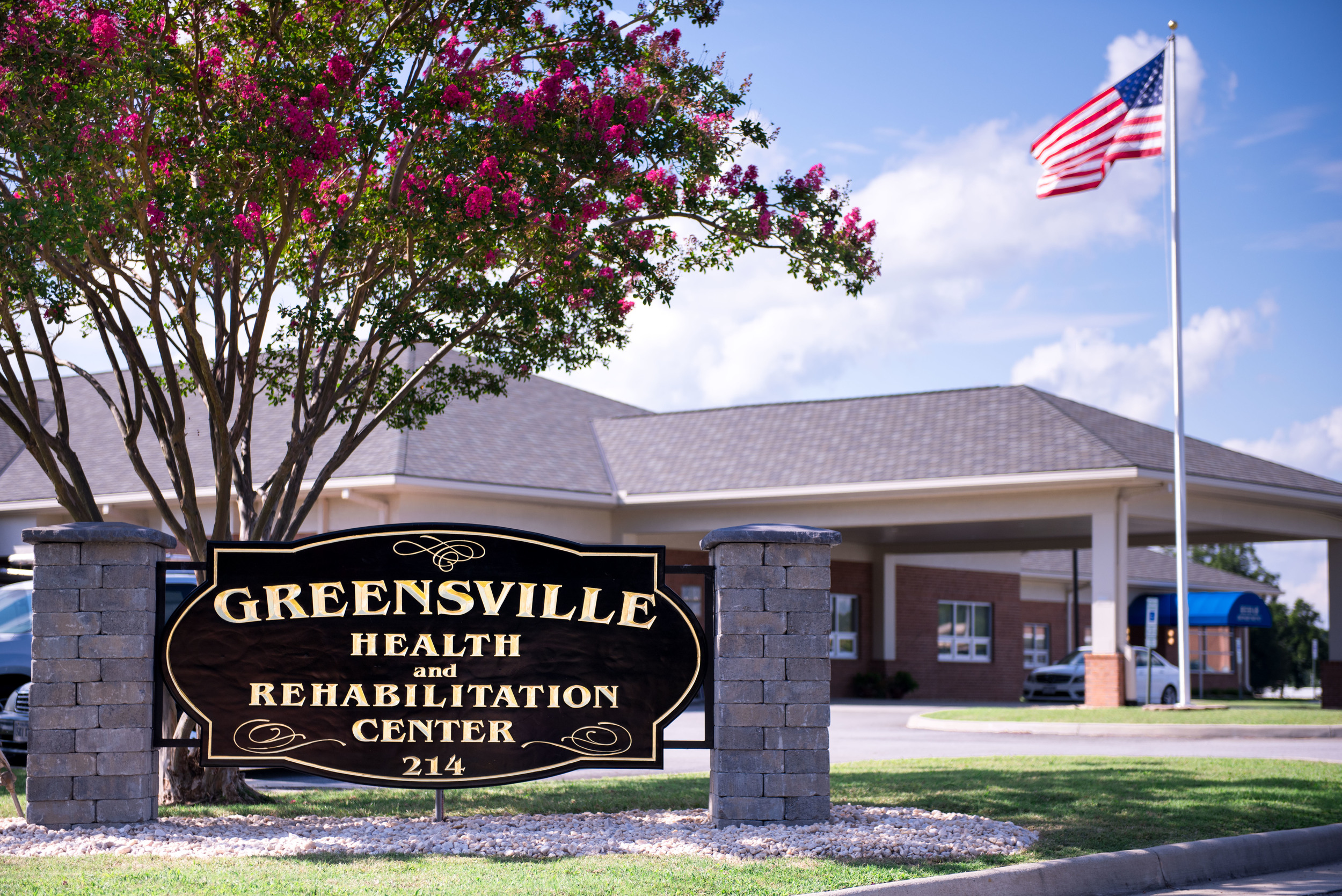 This is a picture of our front sign with our facility front entrance in the background!