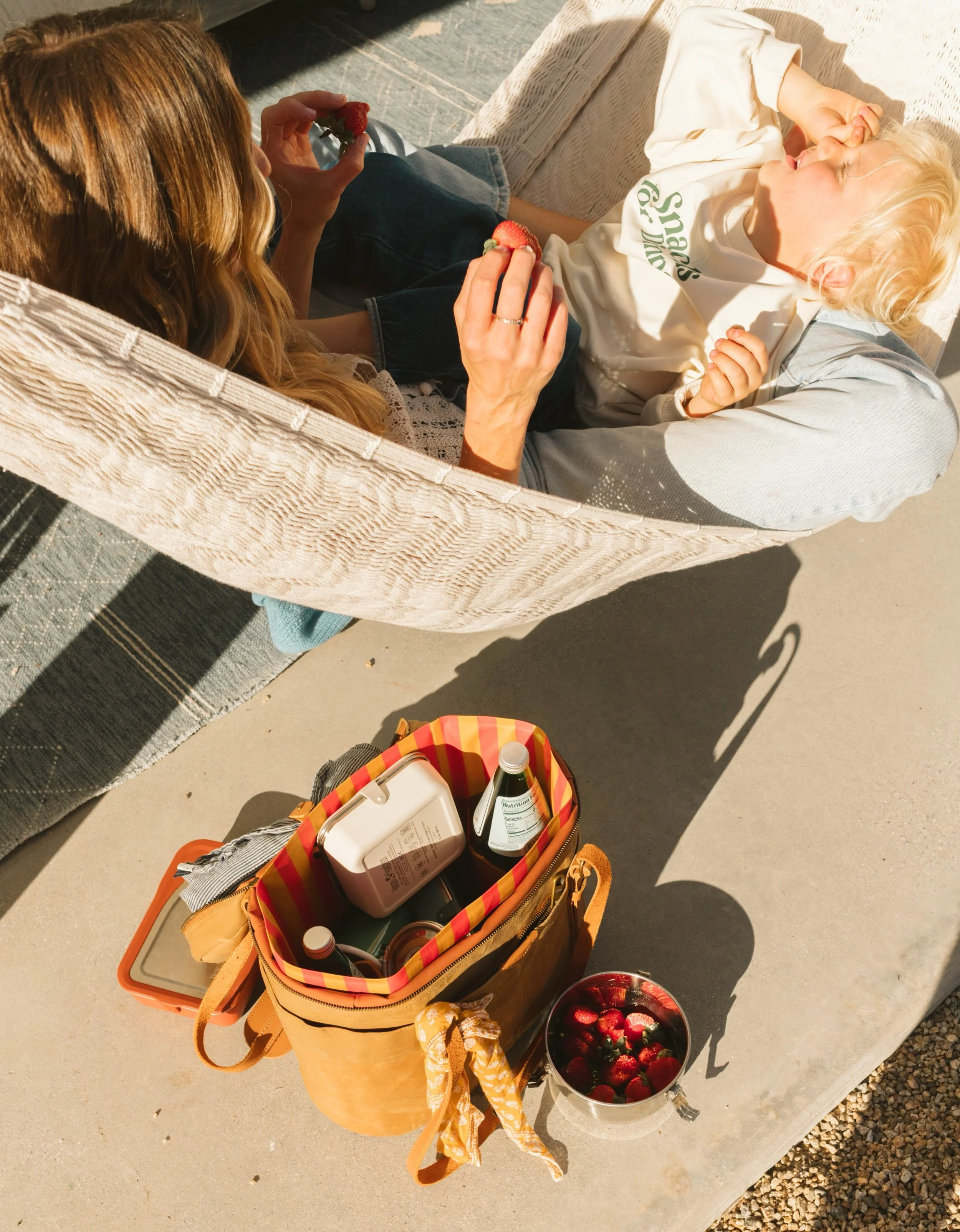 A cooler bag that carries the ease of the in between&mdash;SNACKS.
equal parts practical and cute ;)