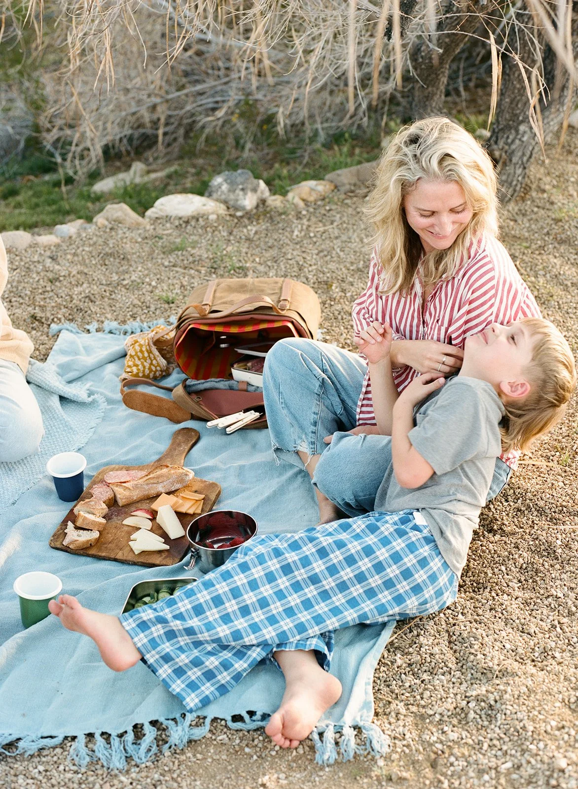 Goldie Picnic Bag packed with kids snacks water bottles and fruit for a day out.jpg