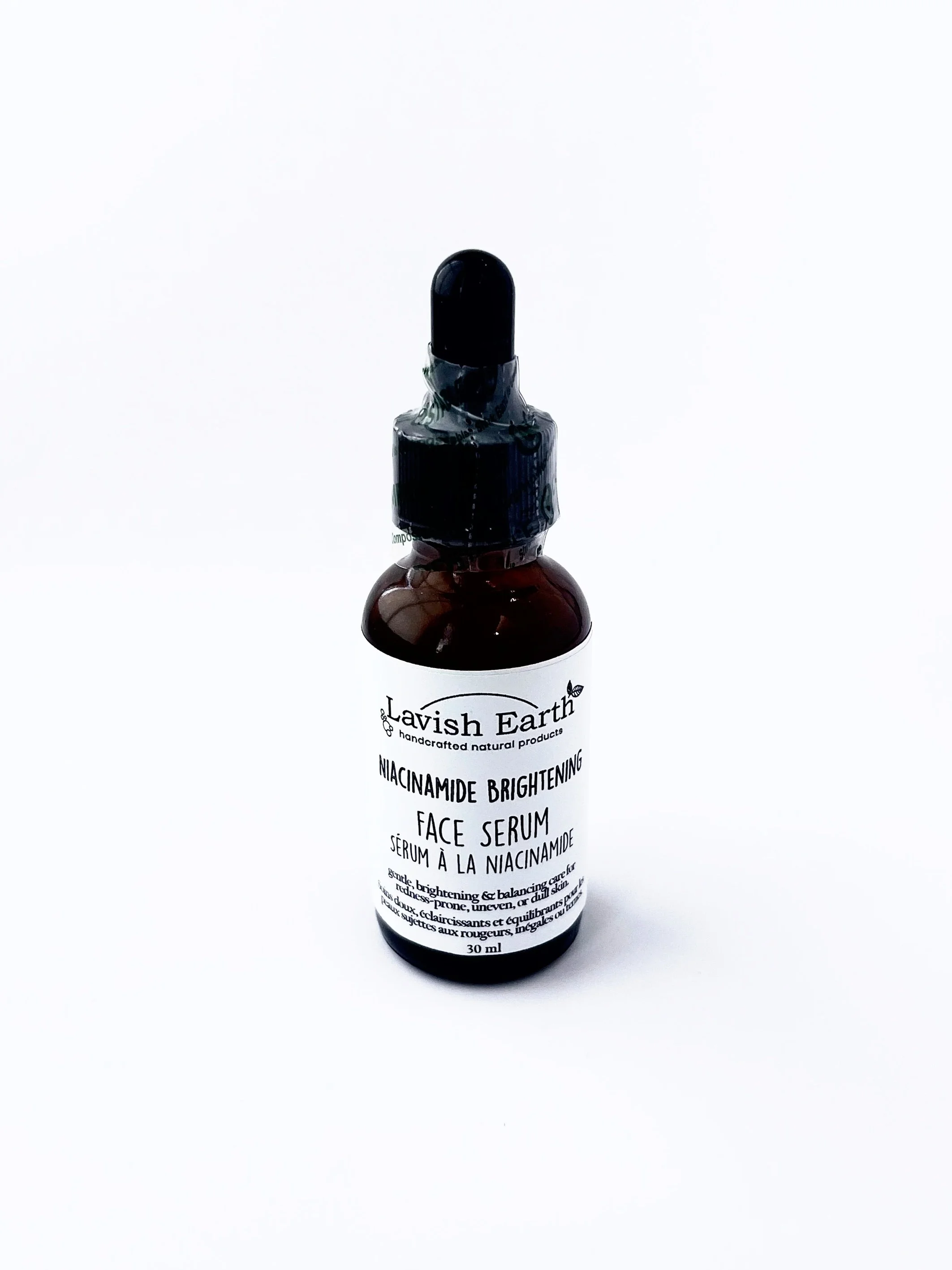 Lavish Earth niacinamide brightening face serum in amber dropper bottle, natural skincare Ontario