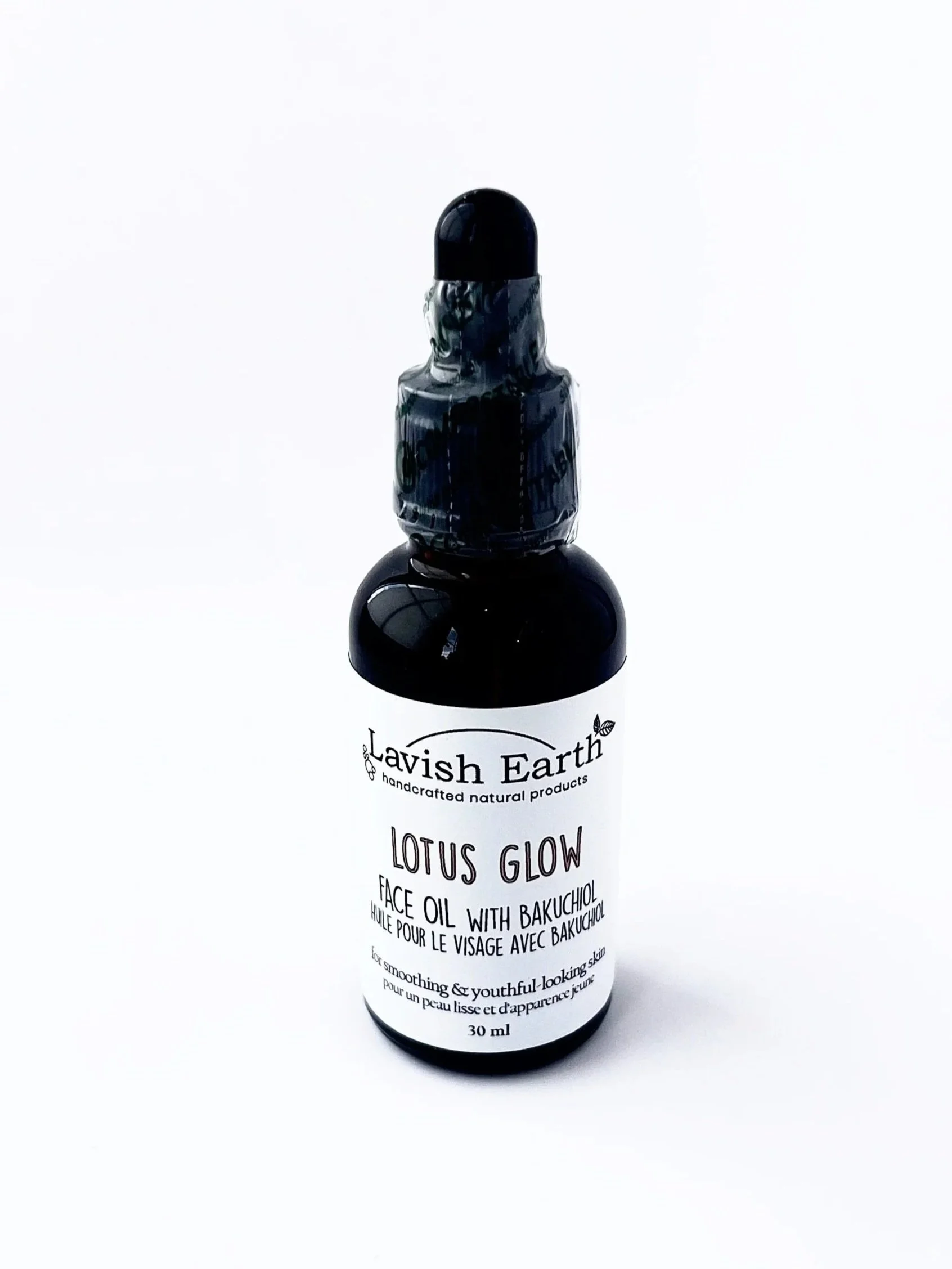 Lavish Earth Lotus glow face oil in amber dropper bottle, natural skincare Ontario