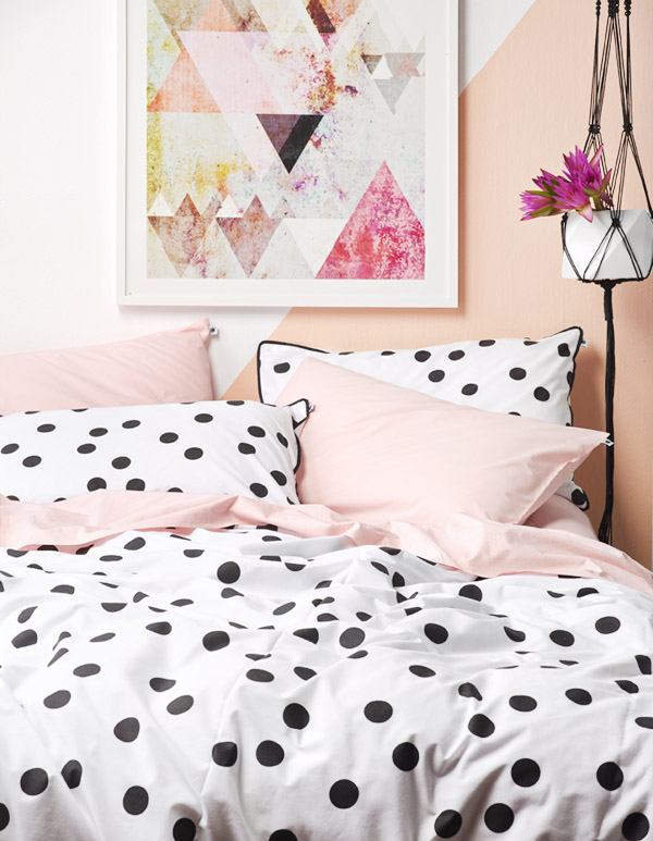 Don't be afraid of bright colors and bold patterns in your bedroom! How to make bold sheets fit into a sophisticated, grown-up space at danielleandco.com