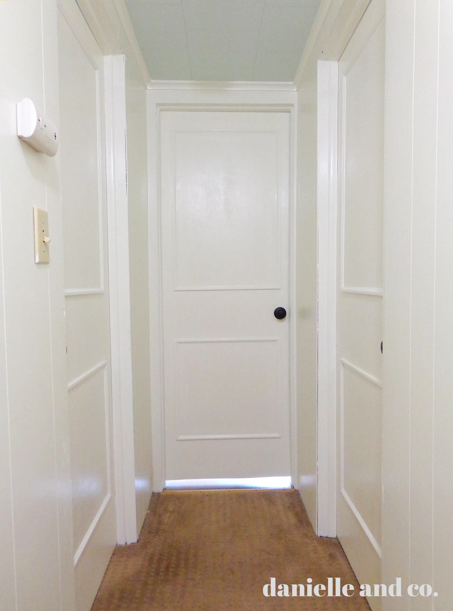 A DIY makeover of five (!!!!) doors at once! How to make old hollow-core doors clean and bright with paint and trim, from danielle and co.