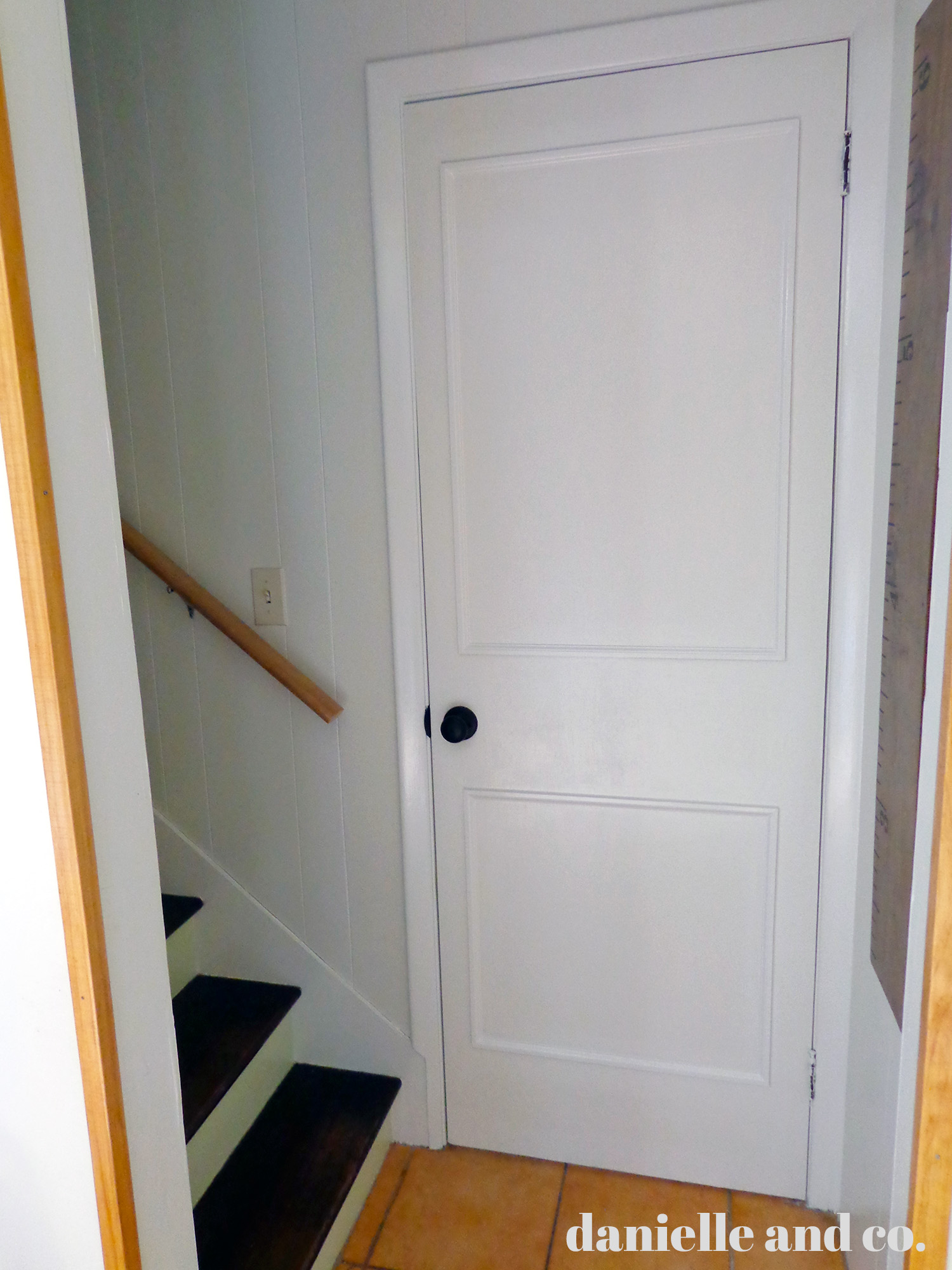 A DIY makeover of five (!!!!) doors at once! How to make old hollow-core doors clean and bright with paint and trim, from danielle and co.