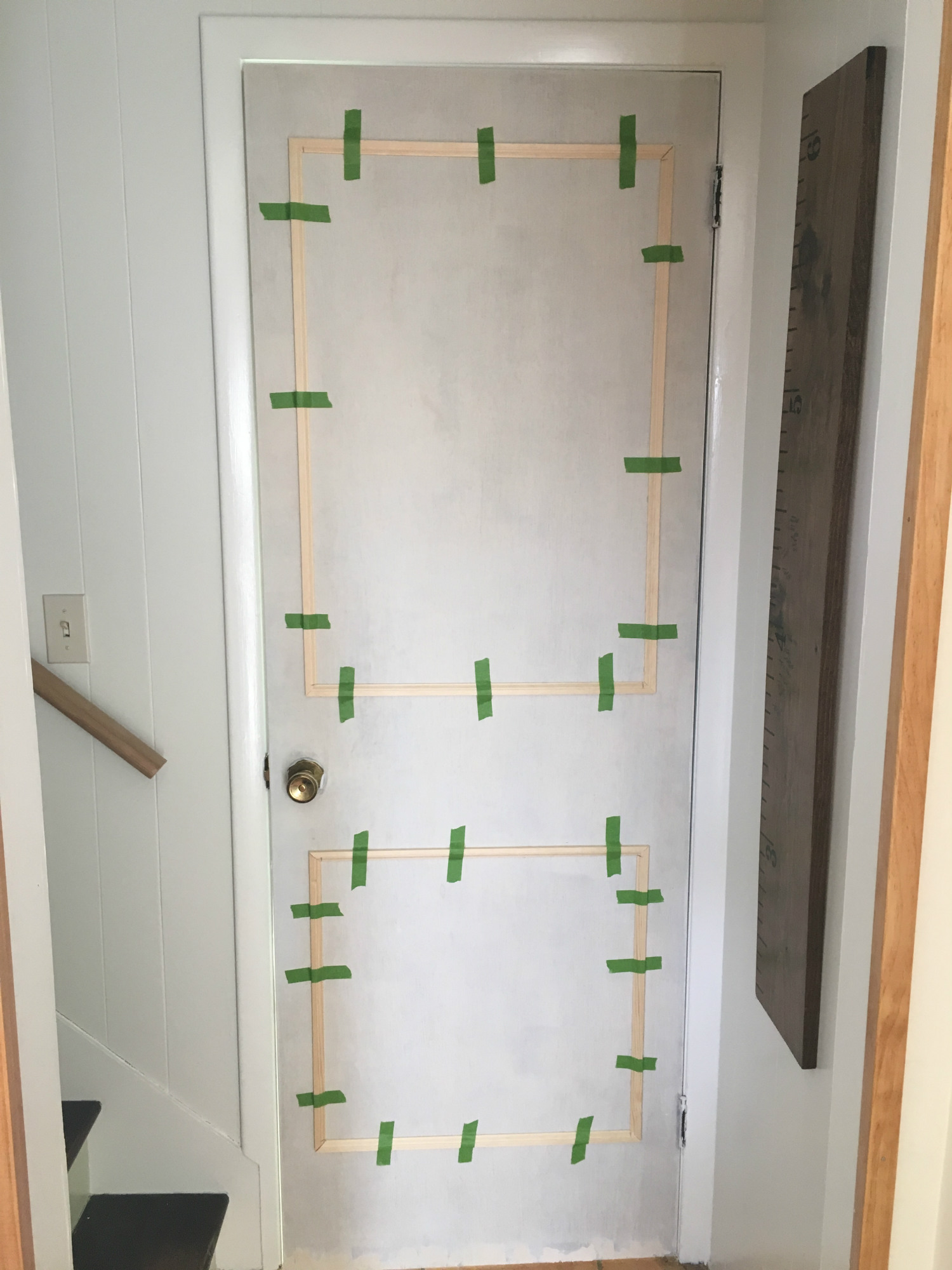 A DIY makeover of five (!!!!) doors at once! How to make old hollow-core doors clean and bright with paint and trim, from danielle and co.