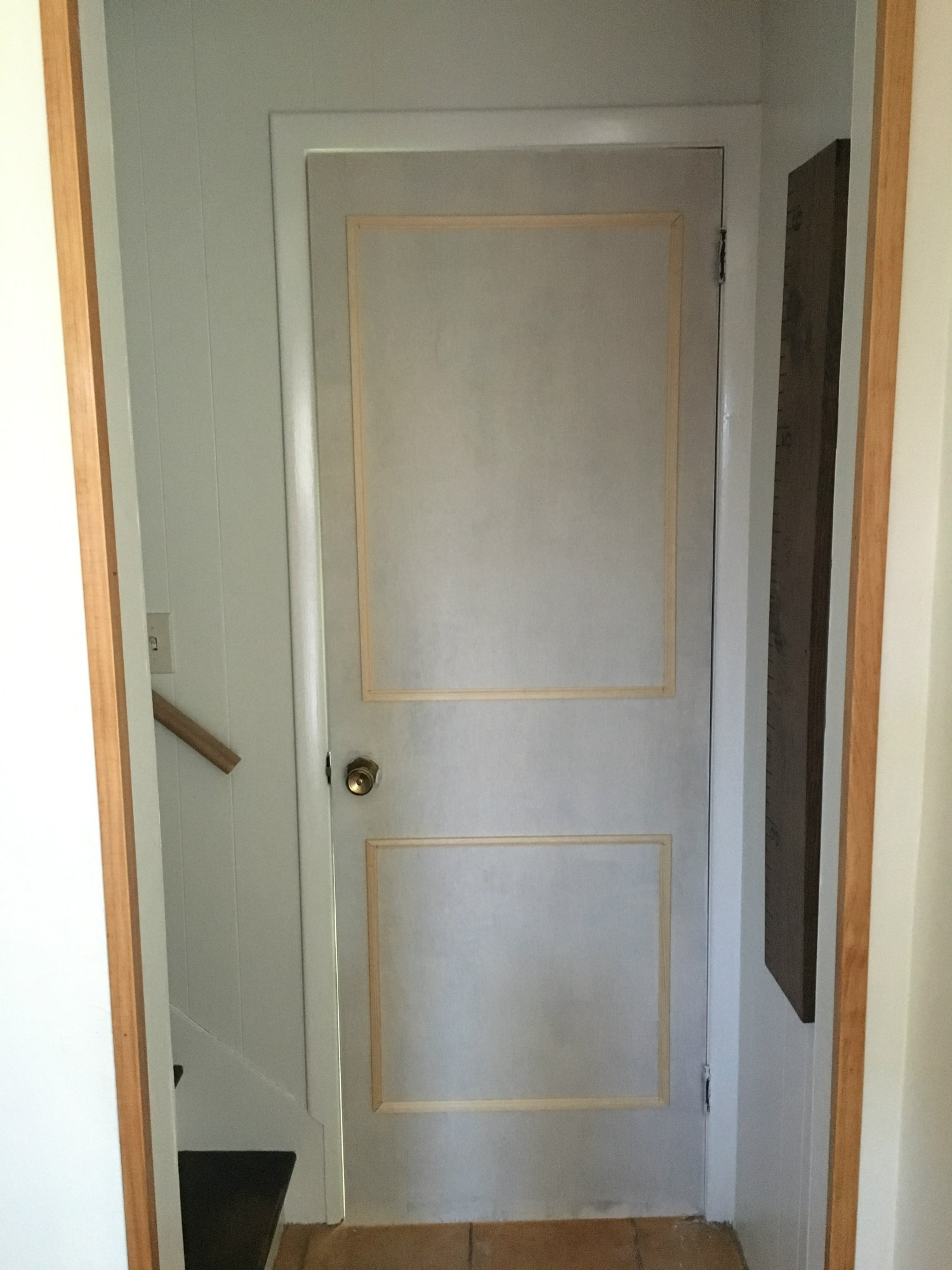A DIY makeover of five (!!!!) doors at once! How to make old hollow-core doors clean and bright with paint and trim, from danielle and co.