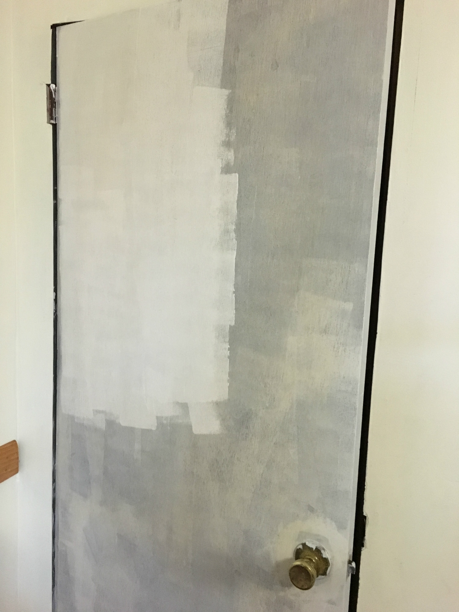 A DIY makeover of five (!!!!) doors at once! How to make old hollow-core doors clean and bright with paint and trim, from danielle and co.