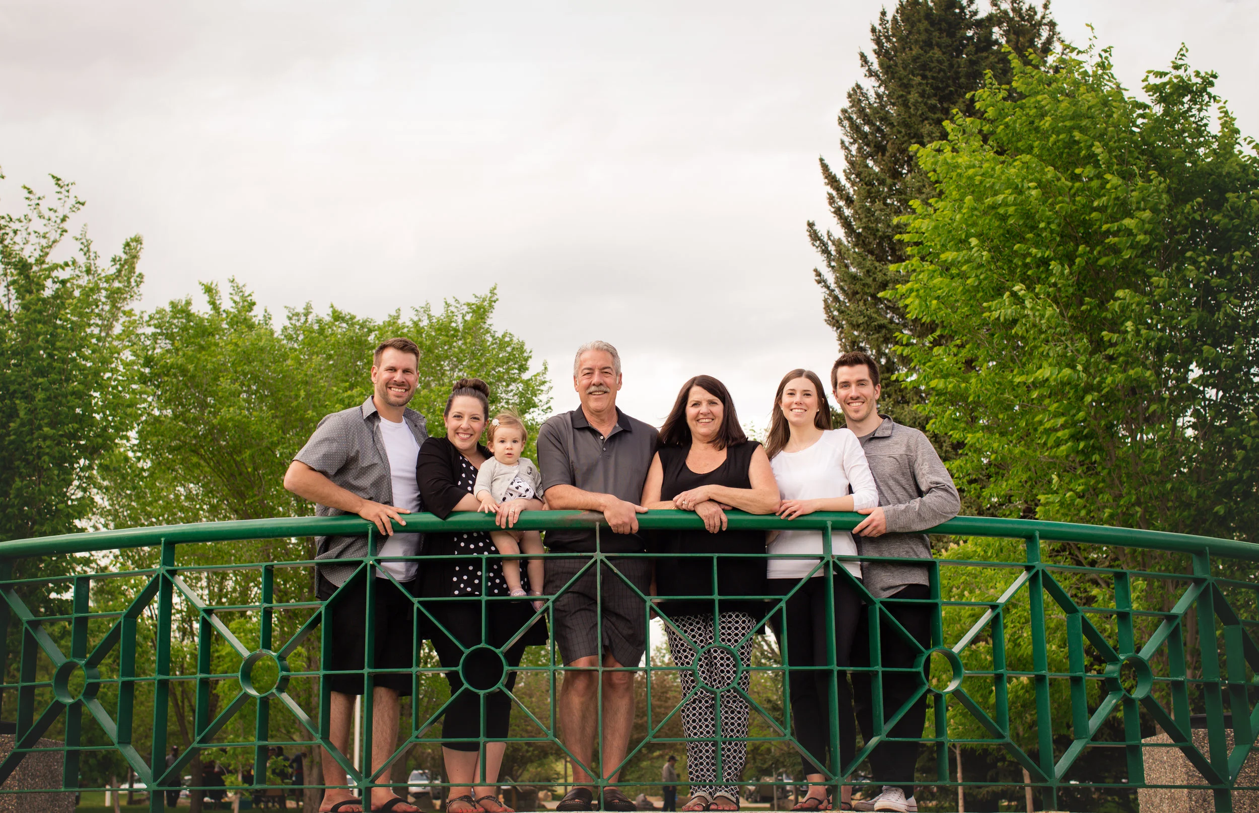 Family of 7 by the rails at Baker's park, Calgary, Alberta. Calgary photographer. Milashka photography