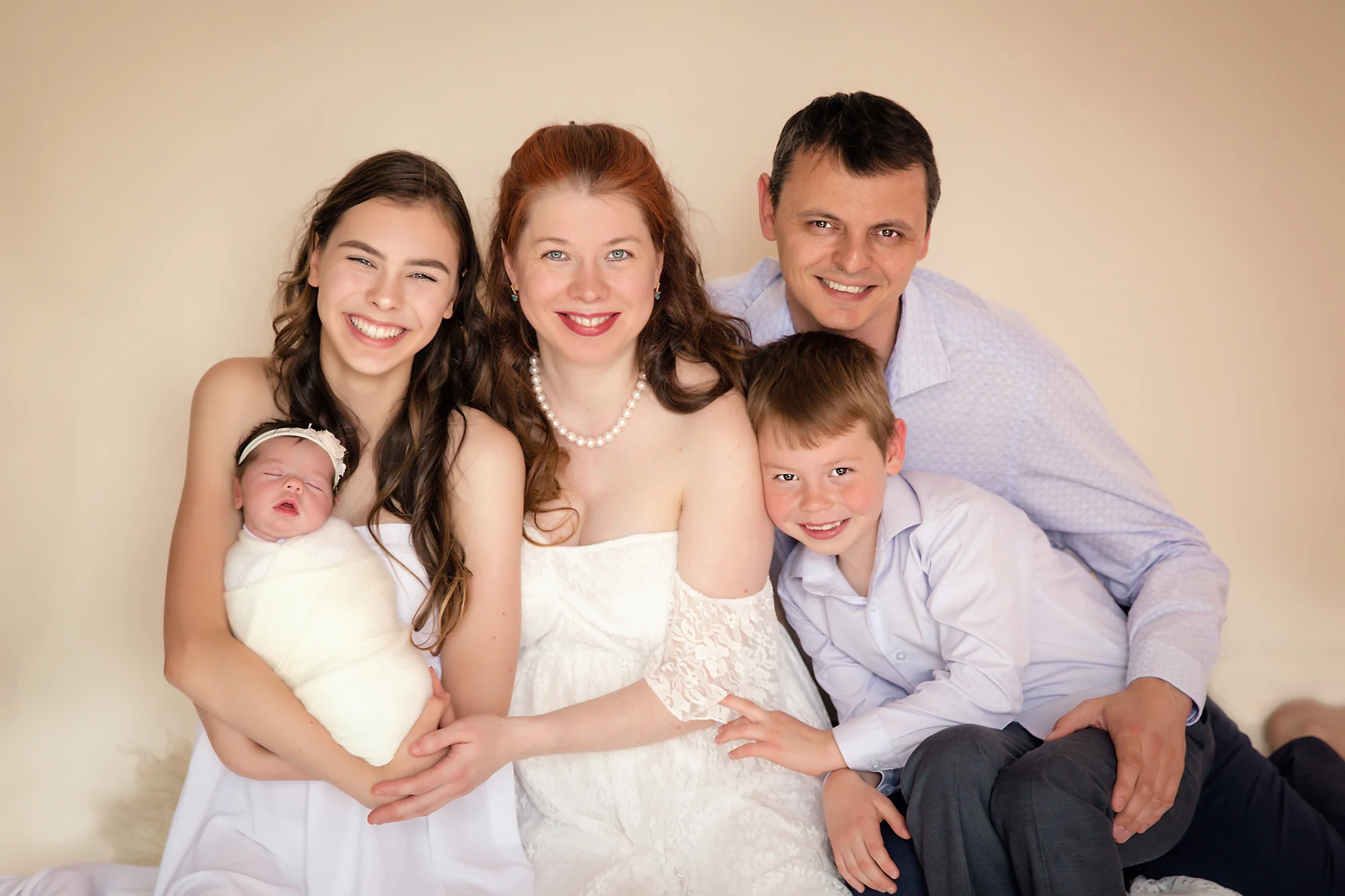 Newborn baby girl photoshoot idea. Calgary and Airdrie Newborn Photographer - Milashka Photography. Family of 5 posed newborn photography.