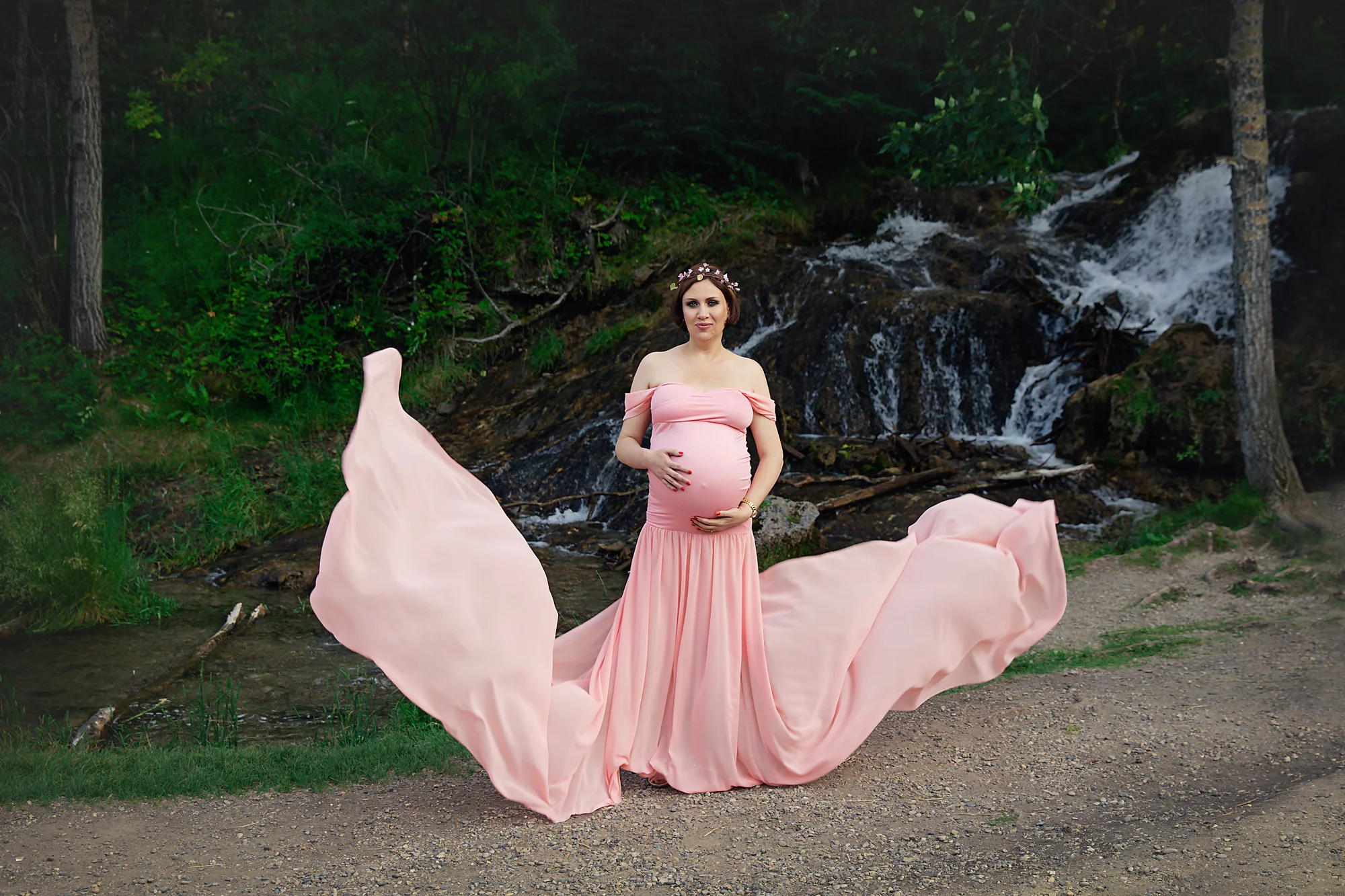 Beautiful mother-to-be in a beautiful setting, in a beautiful peach/pink dress. Calgary and Airdrie Maternity photographer