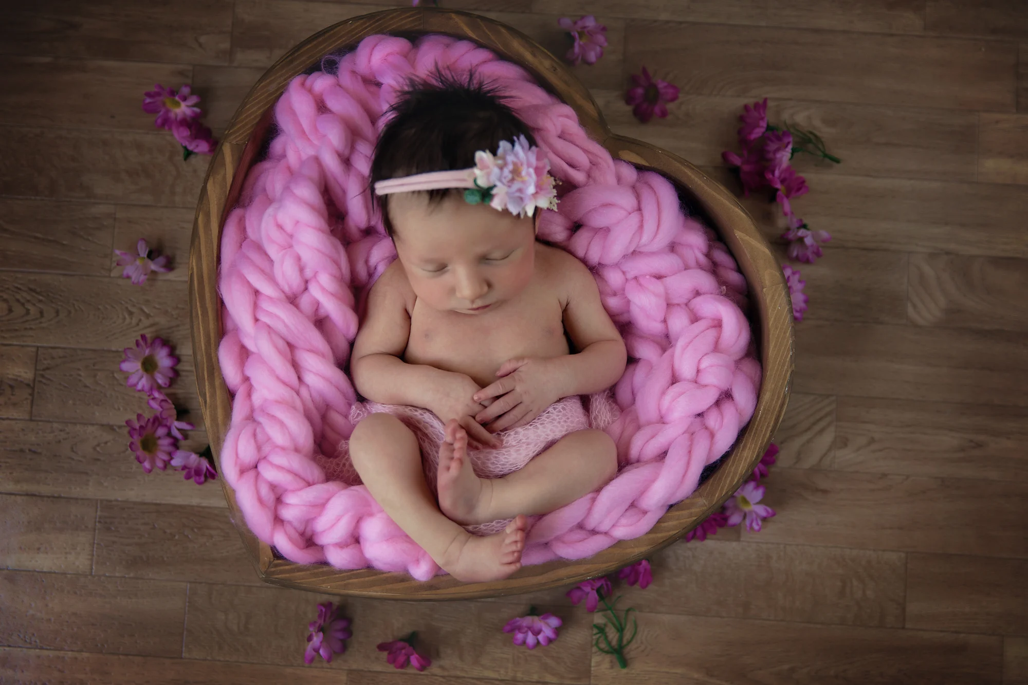 Newborn baby girl in a heart bowl. Newborn Photoshoot ideas. Calgary and Airdrie newborn baby photographer - Milashka Photography