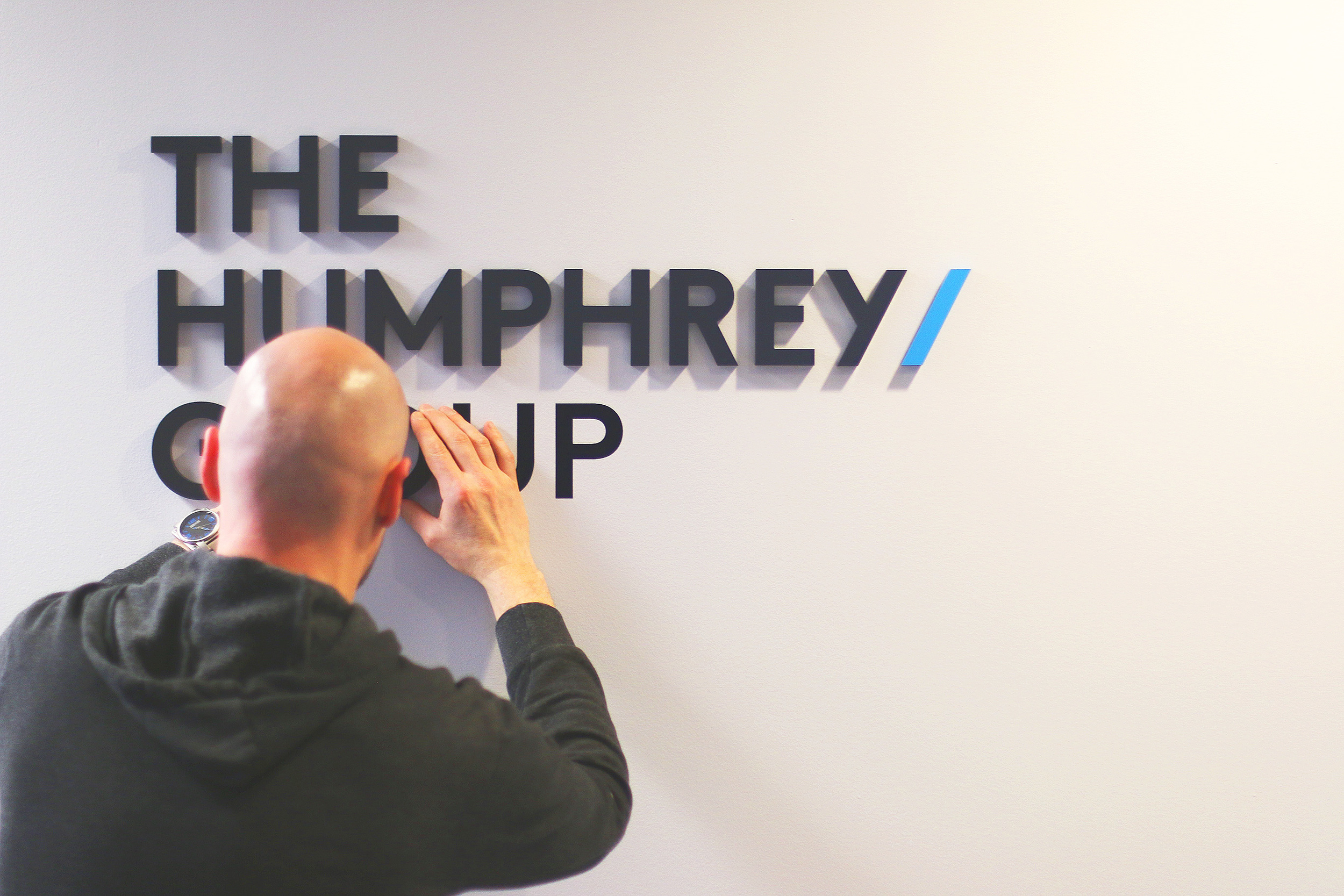 OUR VANCOUVER OFFICE SIGN GETS UPDATED.