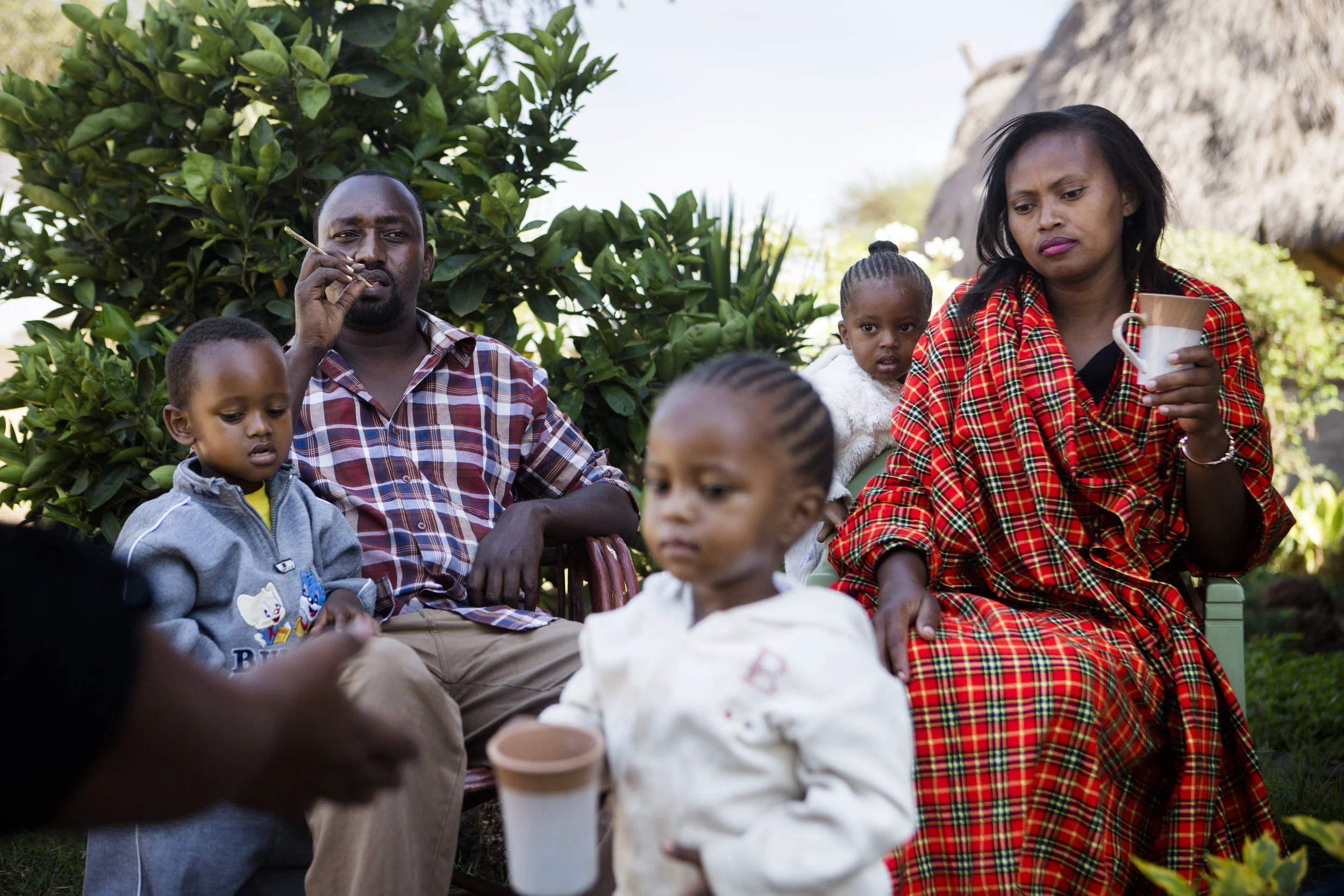  "It's hard to be a Masai without a cow" says Saragi Parsanka. After the drought of 2007 killed all his cows, he's been in the tourism business.&nbsp; The Saragi family is having breakfast at Parsankas work place, since their house burned down a few 