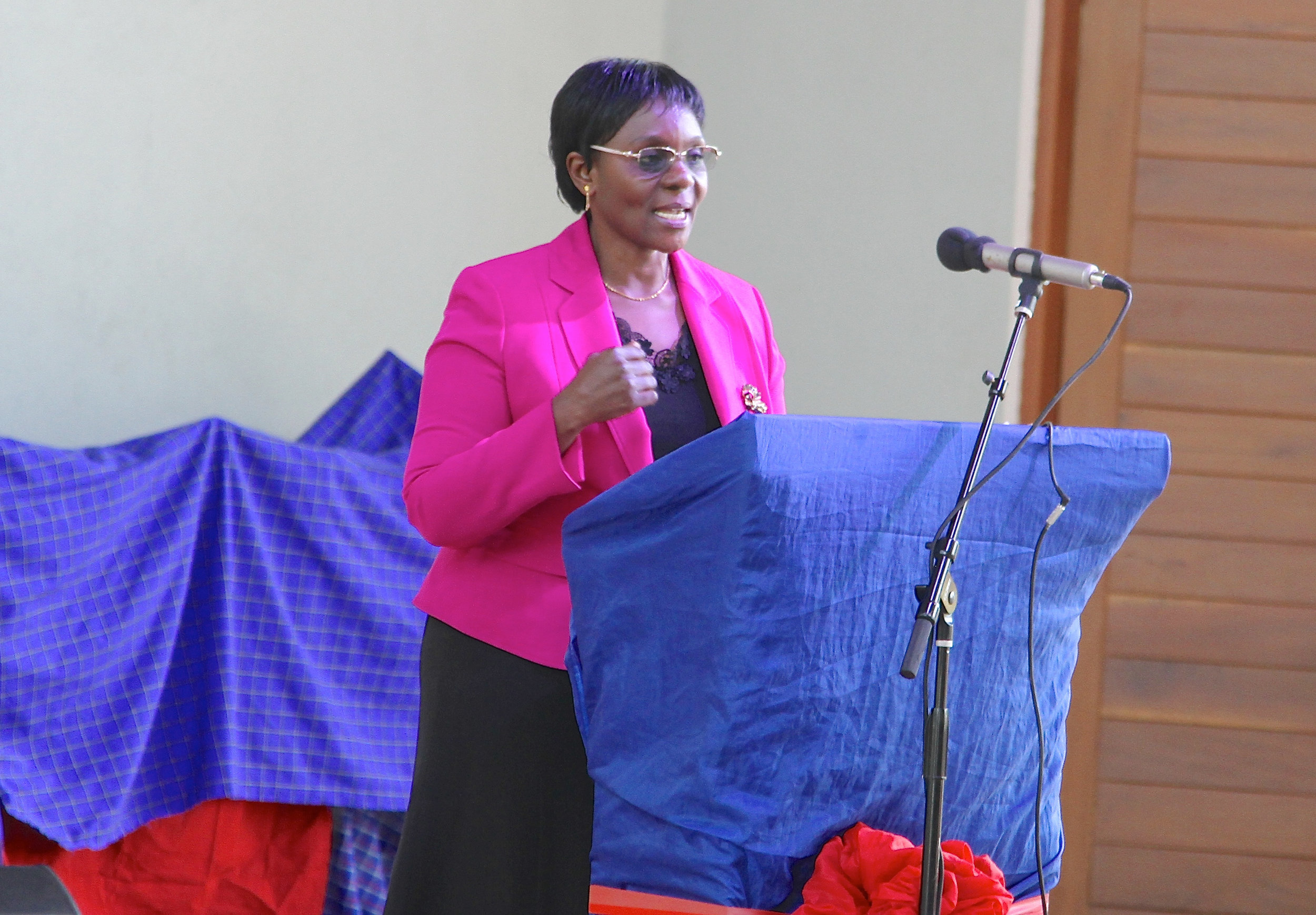  The Deputy Minister of Information, Culture, Arts and Sports Honourable Anastazia Wambura giving her remarks during the CAC Dedication Ceremony. 