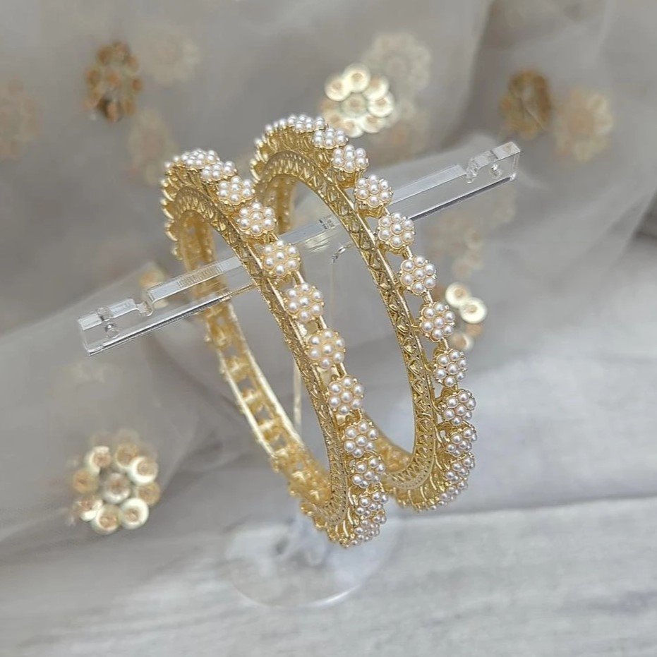 Pair of Ivory Floral Pearl Statement Stone Bangles