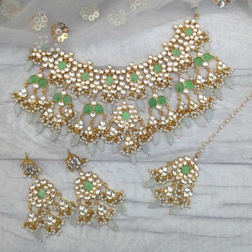 Gorgeous pachi kundan V shape bridal choker necklace jewellery set in this mint colour combination with apple mint stones and muted mint glass drops. 

Can be customised in any colour &amp; also available in plain gold silver. 

TAP photo to shop/pri