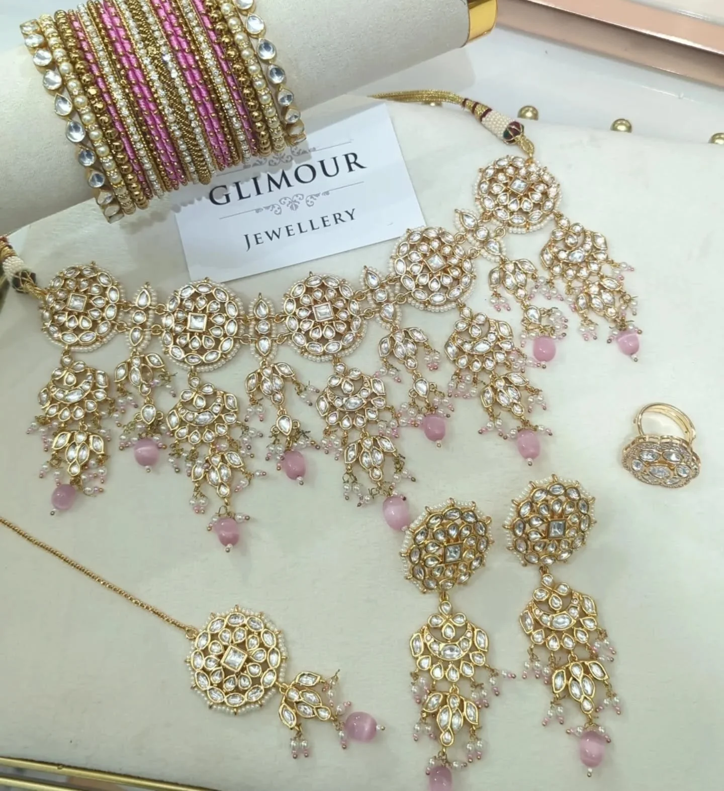 Gorgeous Kundan choker or necklace jewellery set with a pop of pink 🩷 
Matched with bangles and finger ring.
Also available in green and maroon. Can be customised in any colour.

A lovely guest party wear piece or for a pre bridal event like engagem