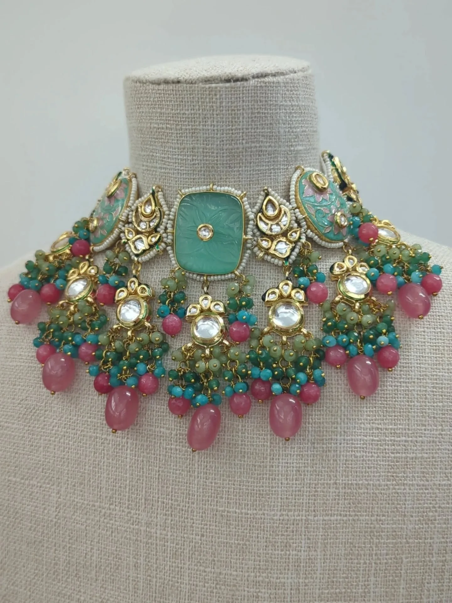 Beautiful multi coral Meenakari Kundan choker set with tikka headpiece &amp; earrings. 
Also available in lots of colours. DM to order/price. 

A stunning party wear piece or bridal pre event piece. 

DM us to book your bridal jewellery appointment i