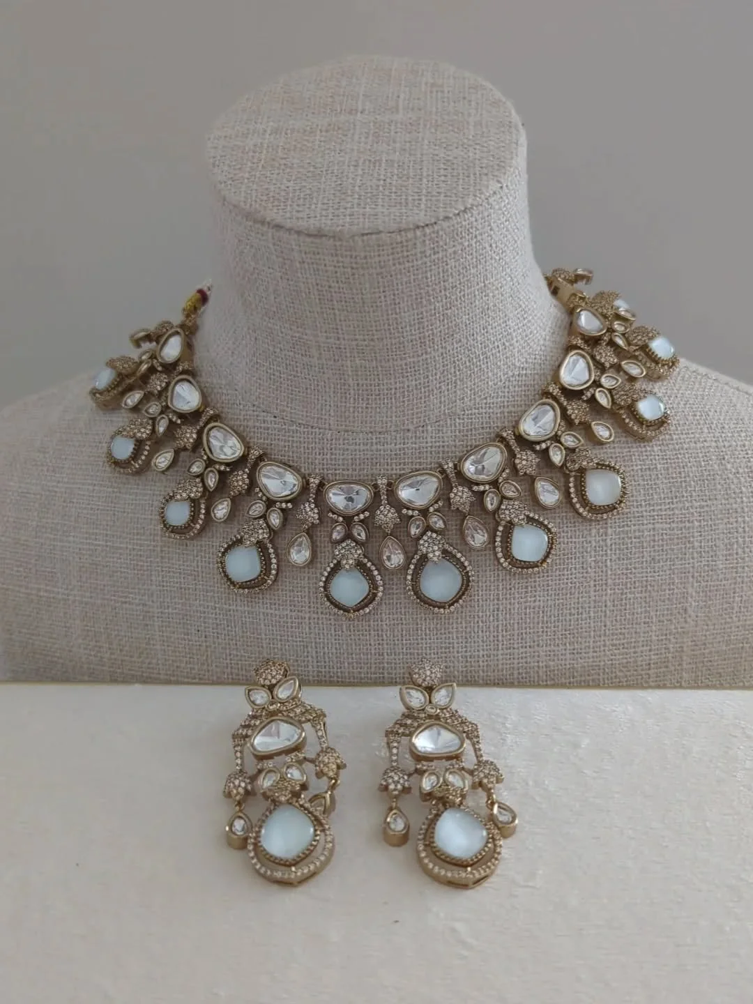 Neutral gold silver Moissanite &amp; American diamond neckline jewellery set with earrings 🤍
A lovely elegant piece for reception bridal wear, party guest wear or pre bridal event. 

Also available in different colours. DM to shop/price. In stock &a