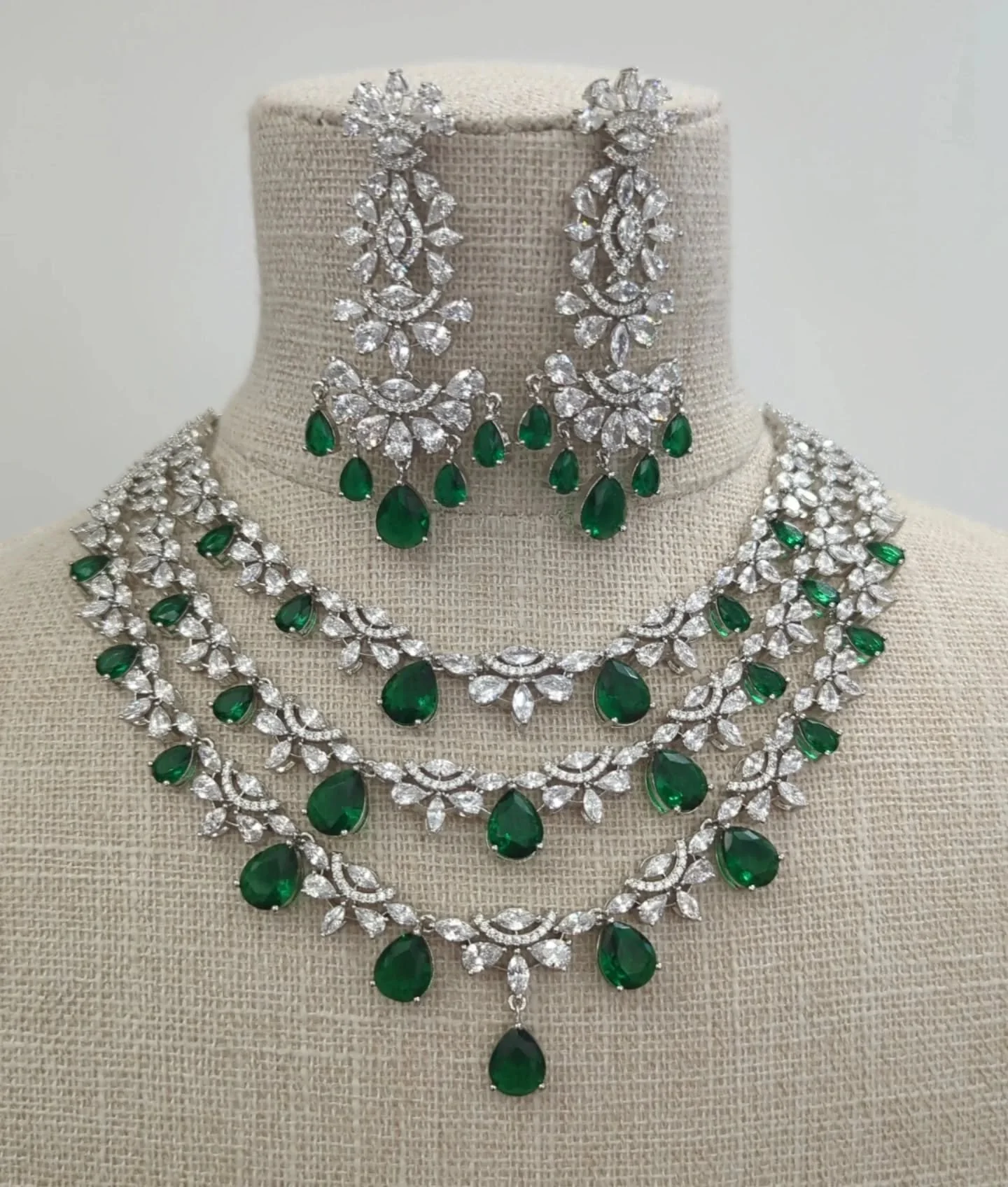 Beautiful sparkly green full silver American diamond neckline set 💚

In stock &amp; ready to ship. Gorgeous layered piece for bridal or party guest wear. 

DM us to book your bridal jewellery appointment. We stock all styles of jewellery including c