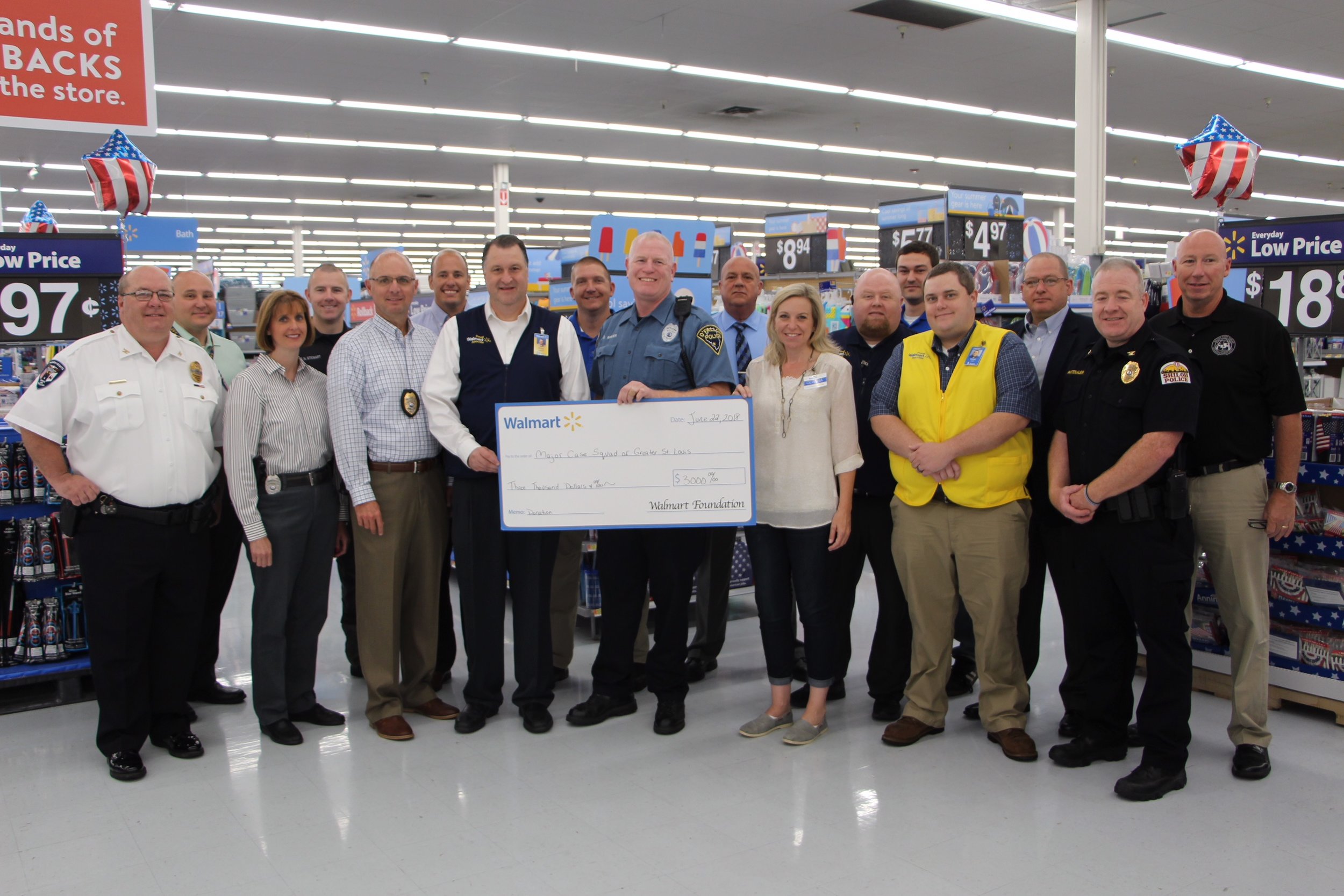 Wal-Mart Regional Director of Asset Protection Presents Donation