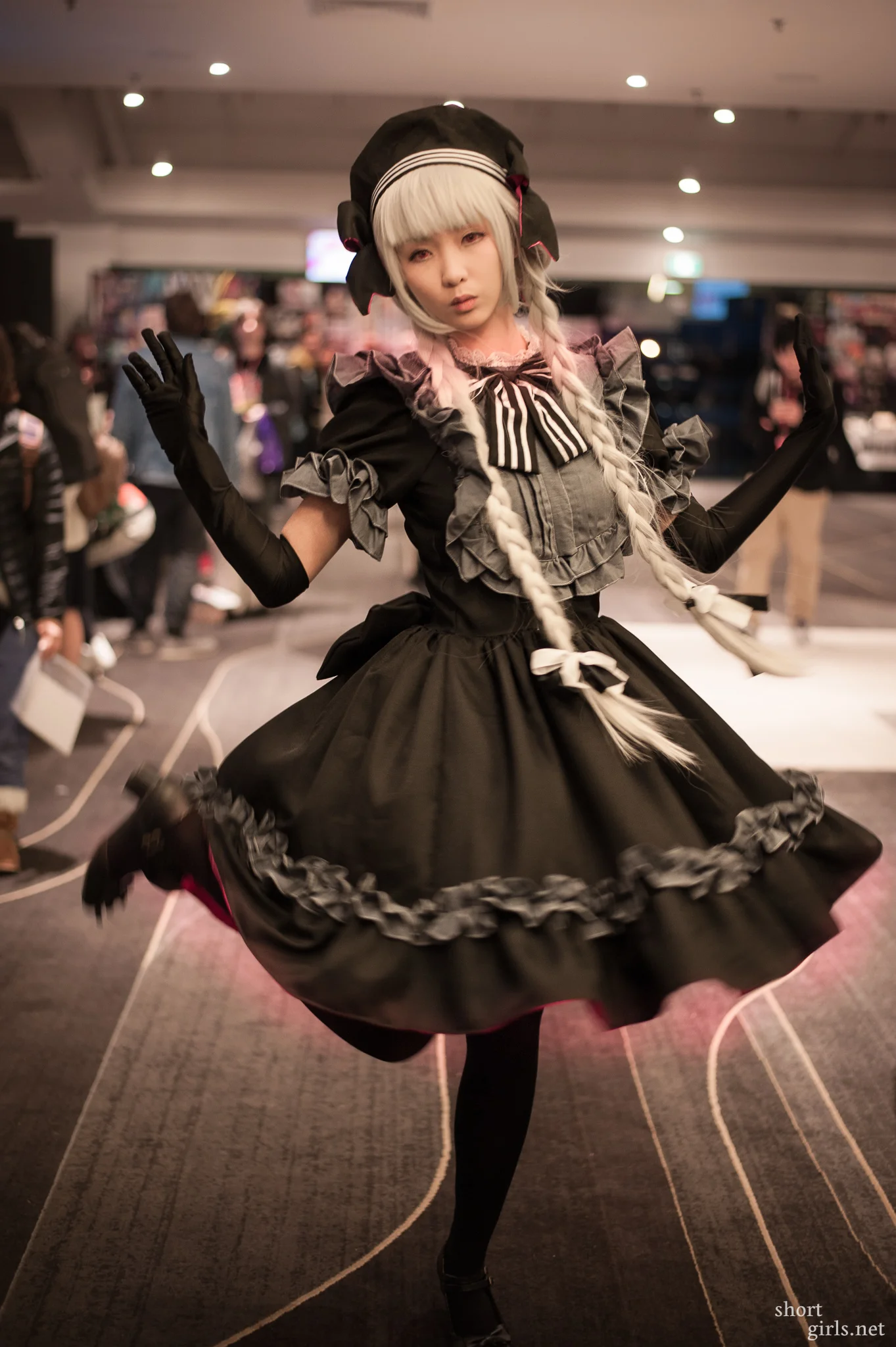  I picked the most decent lighting available, which was a spectacularly poorly-lit hallway with people walking past non-stop. 