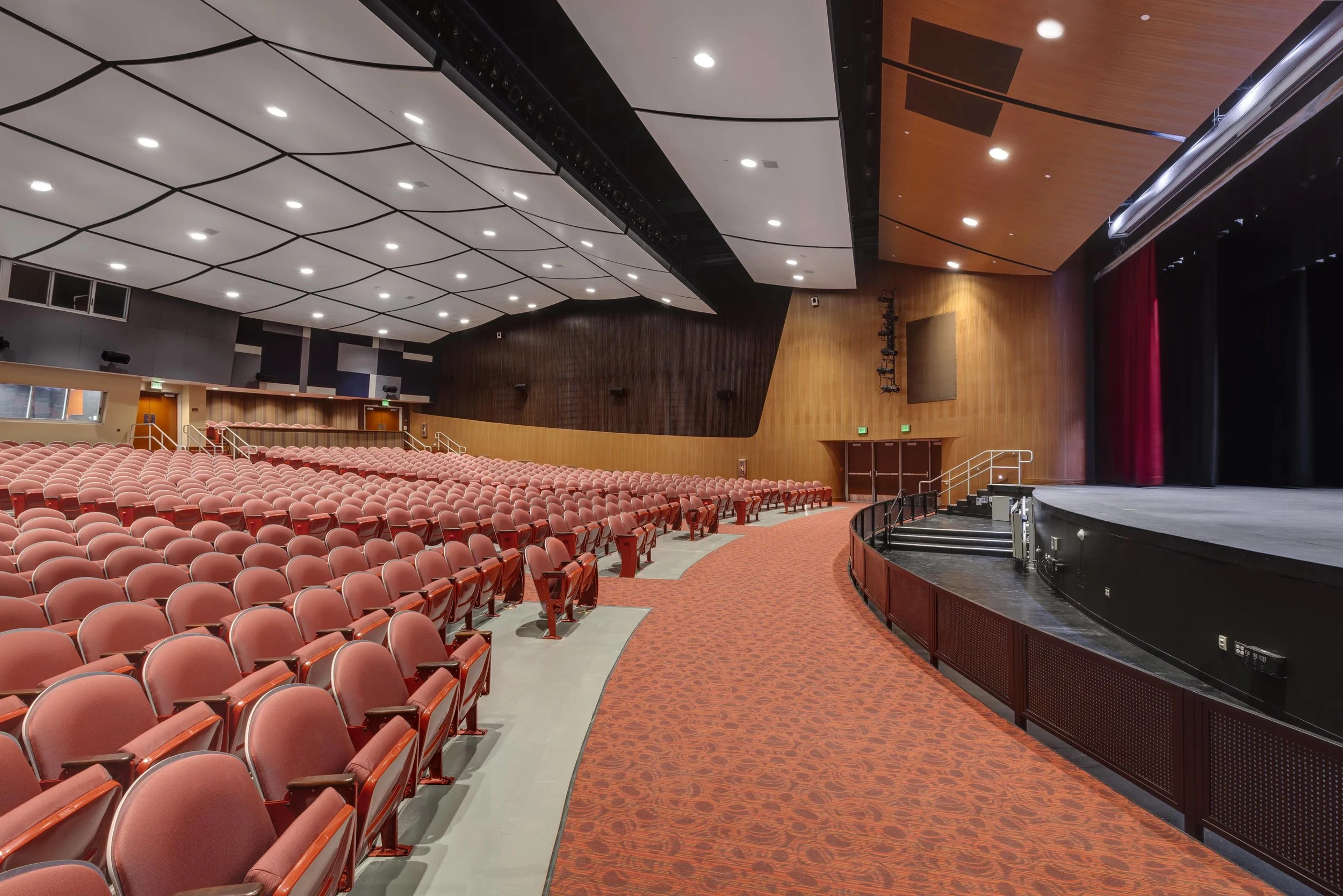 Complete renovation of the interior with improved lighting and acoustics. The original red seat styling was replicated to preserve the historical connection.