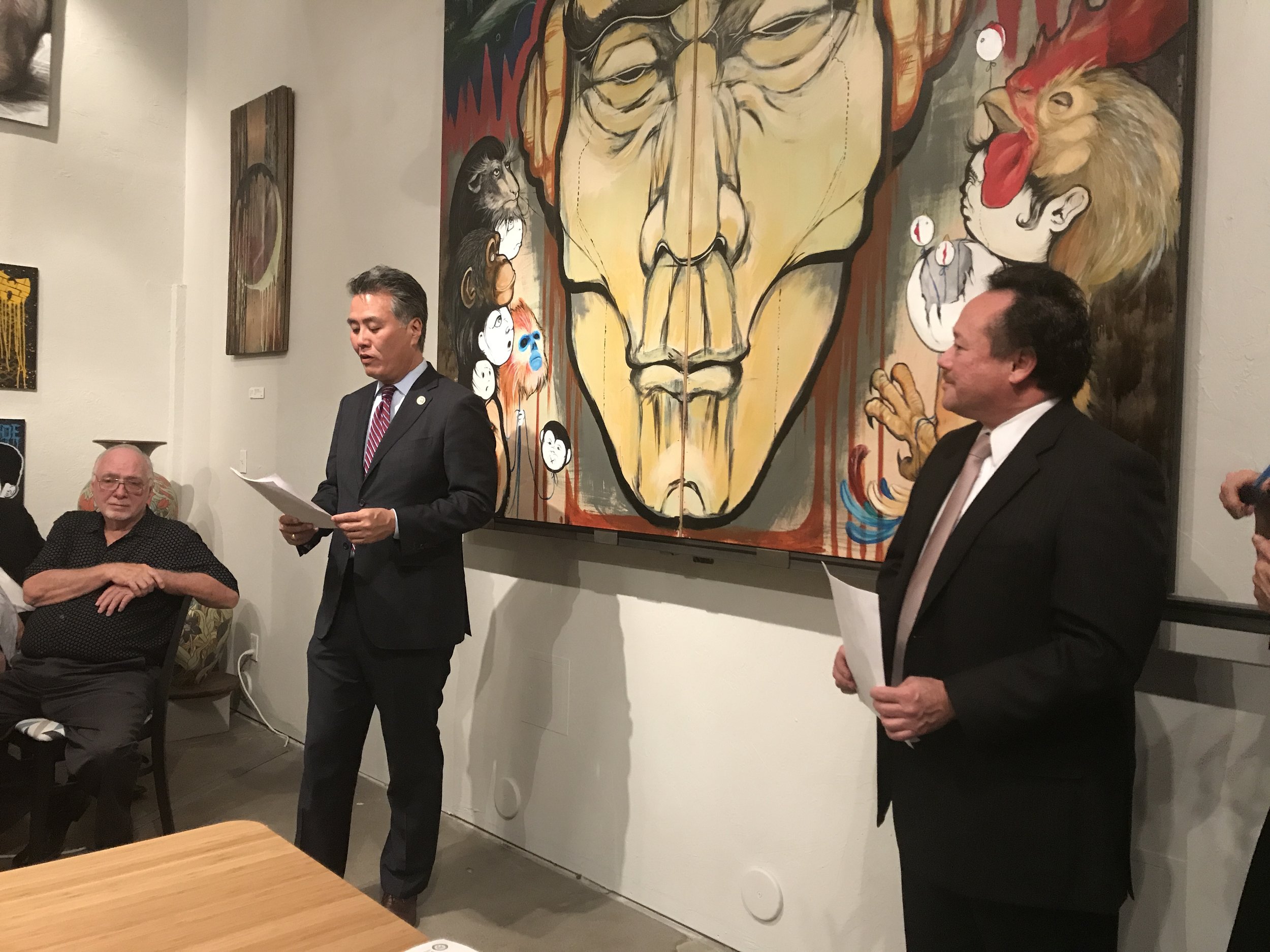 Congressman Takano announcing the winners