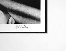 Signature location is black pencil in white border of print.