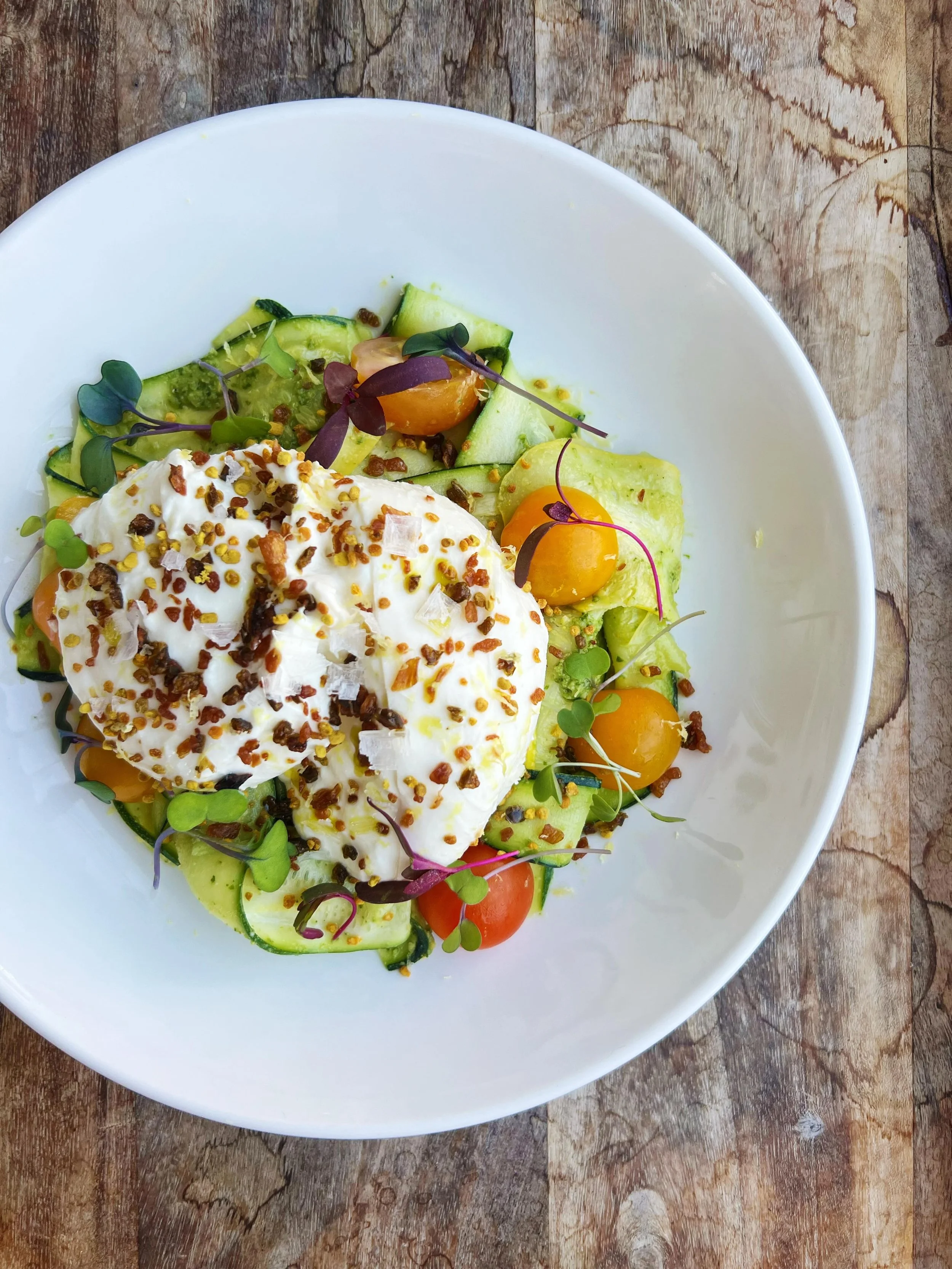 ☀️🍴🌿☀️🍴🌿

house stretched burrata 
fifer orchard zucchini &amp; cherry tomatoes 
jalape&ntilde;o chili crisp
almond pesto 
basil oil 
bee pollen 

☀️🍴🌿☀️🍴🌿

we have opened the PATIO for tonight! 

be sure to book ahead for reservations, 
as o