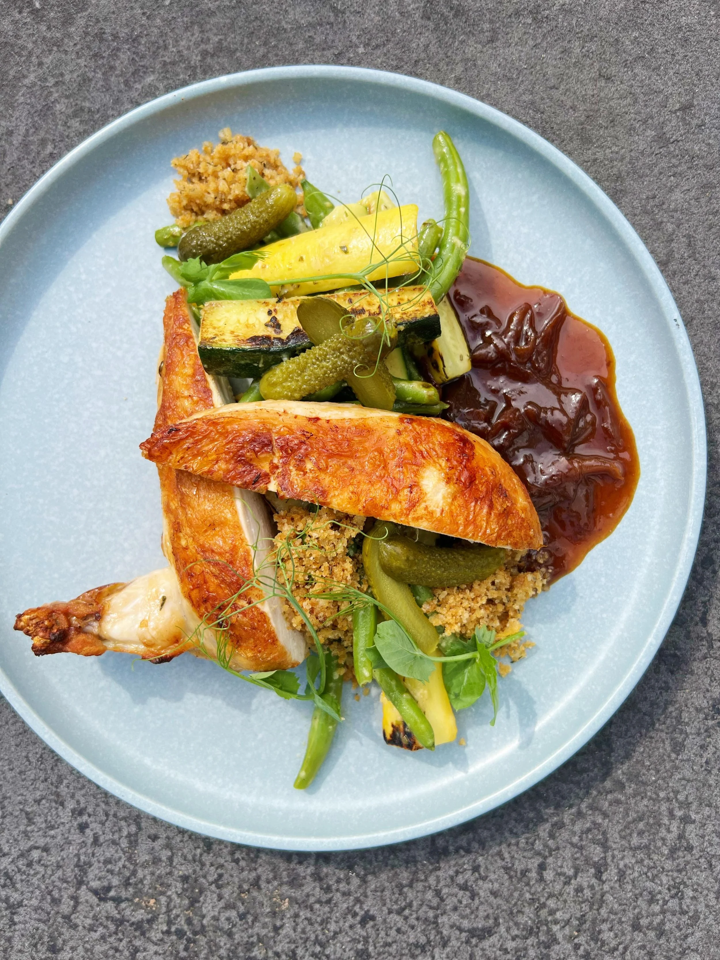☀️ 🌿🍴☀️🌿🍴

pan roasted amish chicken

Fifer Orchard green beans &amp; summer squashes 
super yummy cornichons 
crispy lemon breadcrumb
herb mustard vinaigrette
smoked caramelized onion chicken jus

☀️ 🌿🍴☀️🌿🍴

we have opened the PATIO for toni
