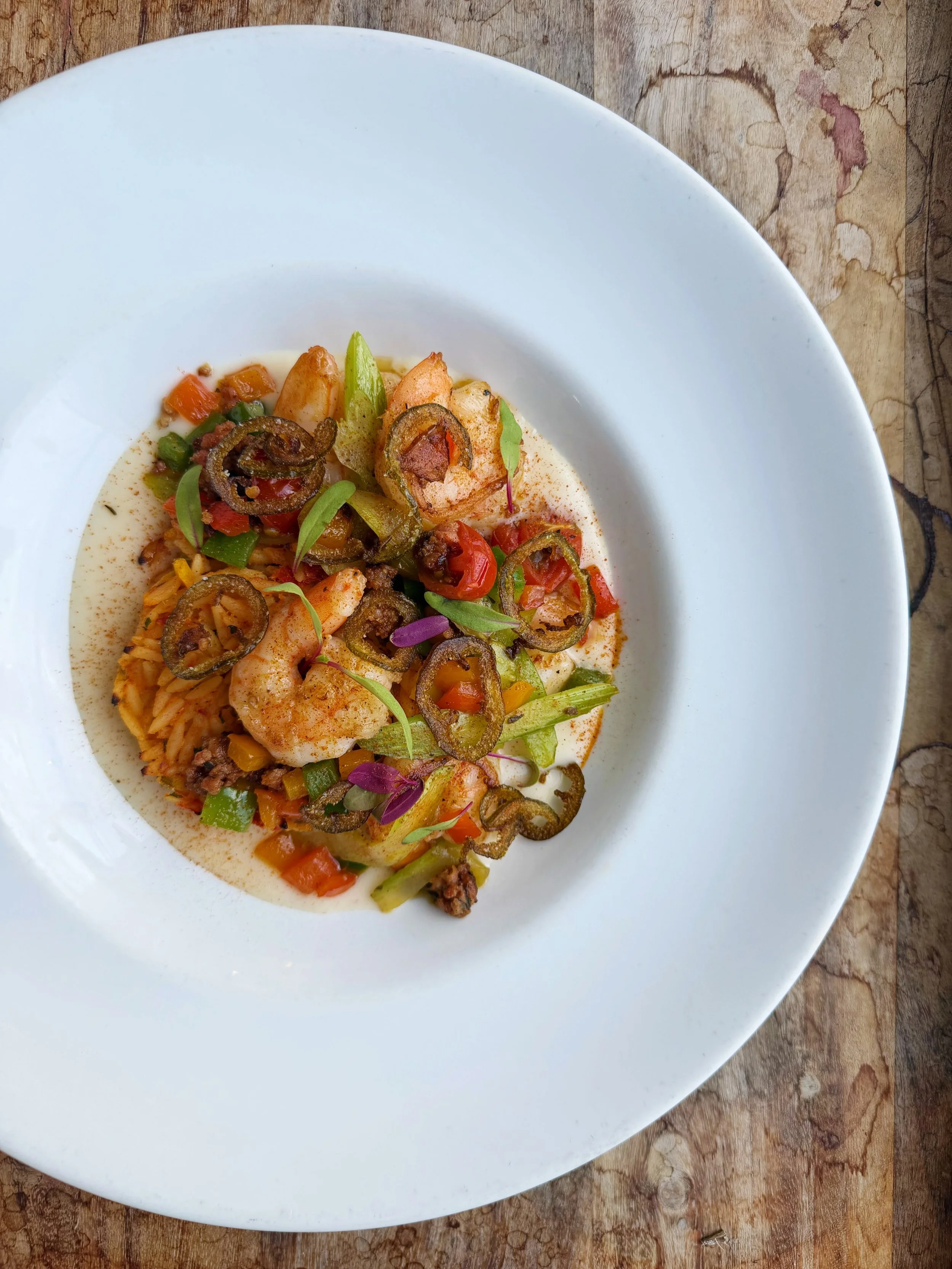 ☀️ 🌿🍴☀️🌿🍴

creole shrimp &amp; cake 
sun dried tomato orzo cake 
housemade chorizo sausage 
fifer orchard tomatoes &amp; peppers
fried jalape&ntilde;os
fish bechamel sauce 
creole dust 

 ☀️ 🌿🍴☀️🌿🍴

we will be closed 2 extra days next week - 