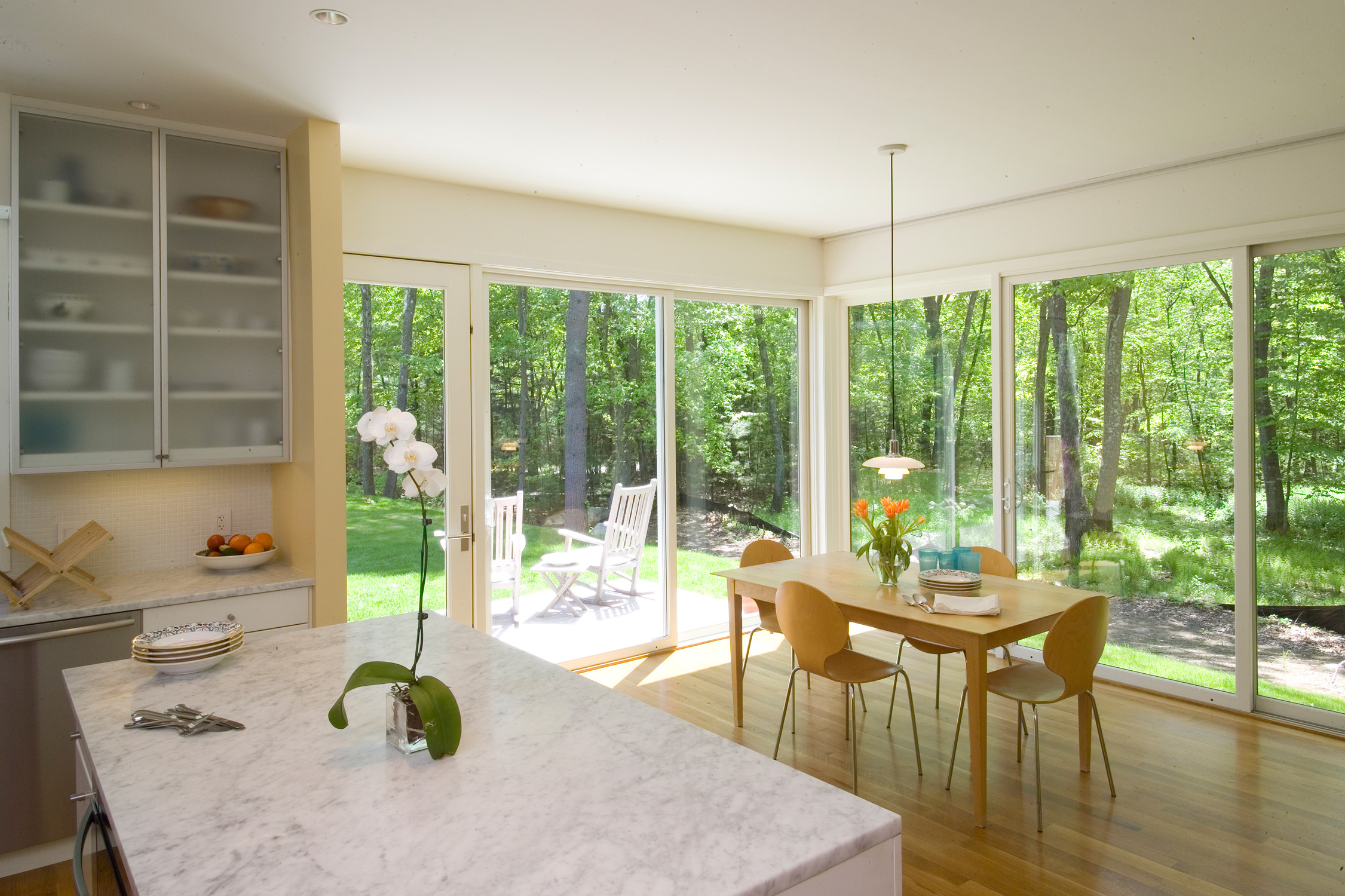 ... informal kitchen and family/breakfast spaces oriented towards the large yard, ...