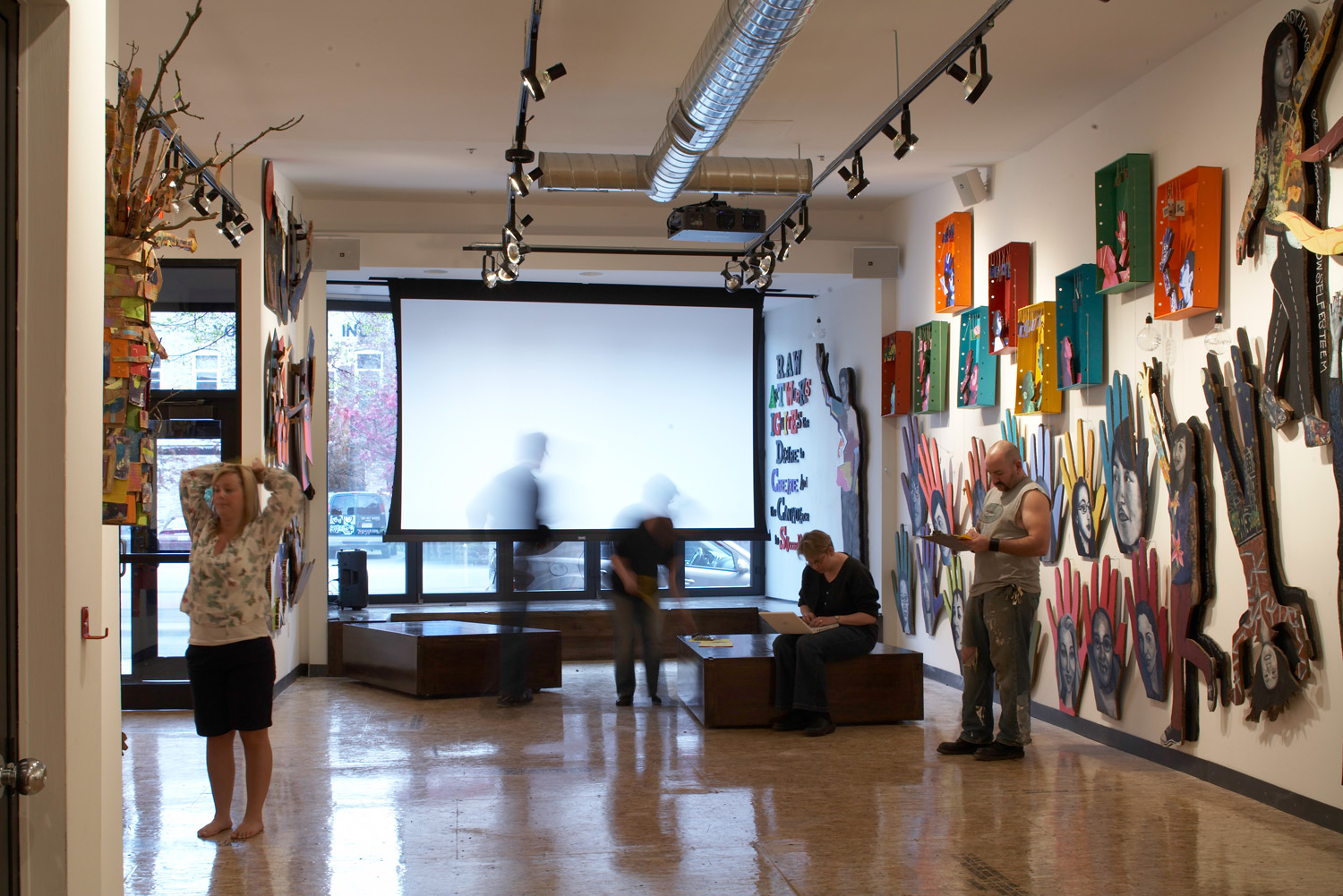 ... moveable platforms can disconnect from the raised floor inside the folding door – rolling out to become pedestals for sculpture and revealing a wrap-around bench for hanging-out in the void they leave behind...