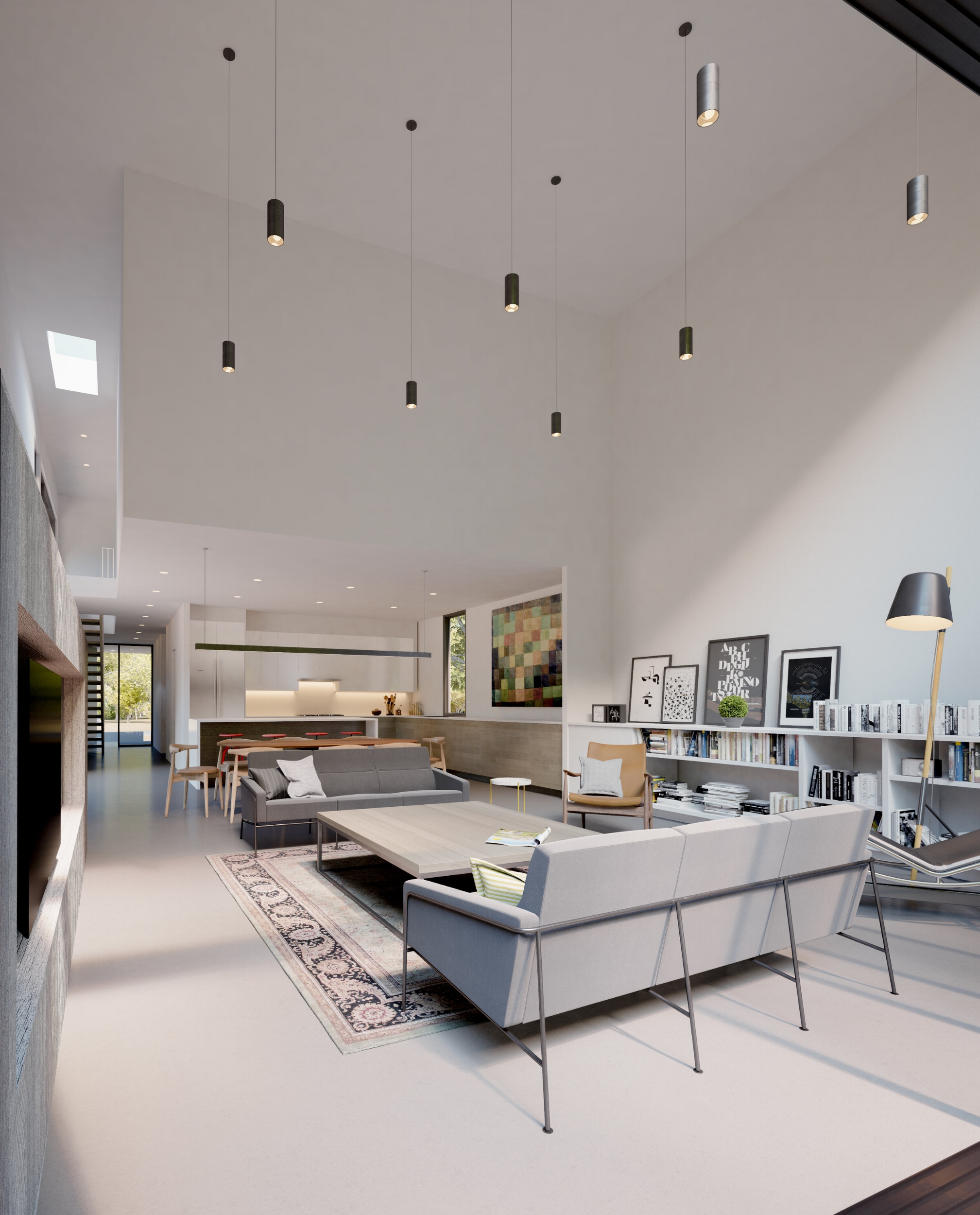 The low kitchen/dining space expands in two directions: into a double-height living room, and out to the exterior patio through monumental glass pocket doors onto an outdoor living room for parties and summer living.